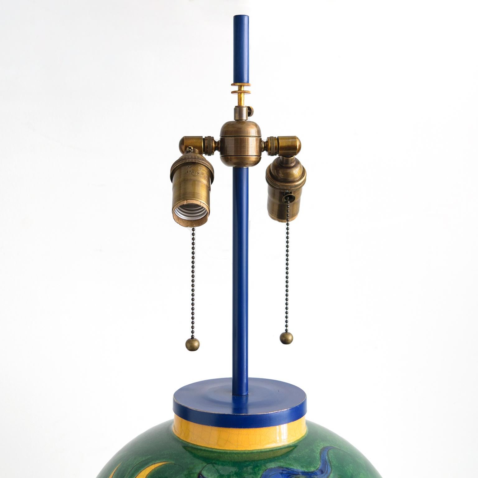 French Louis Drimmer Ceramic Table Lamp with Blue & Yellow Faces on Green Body, France For Sale