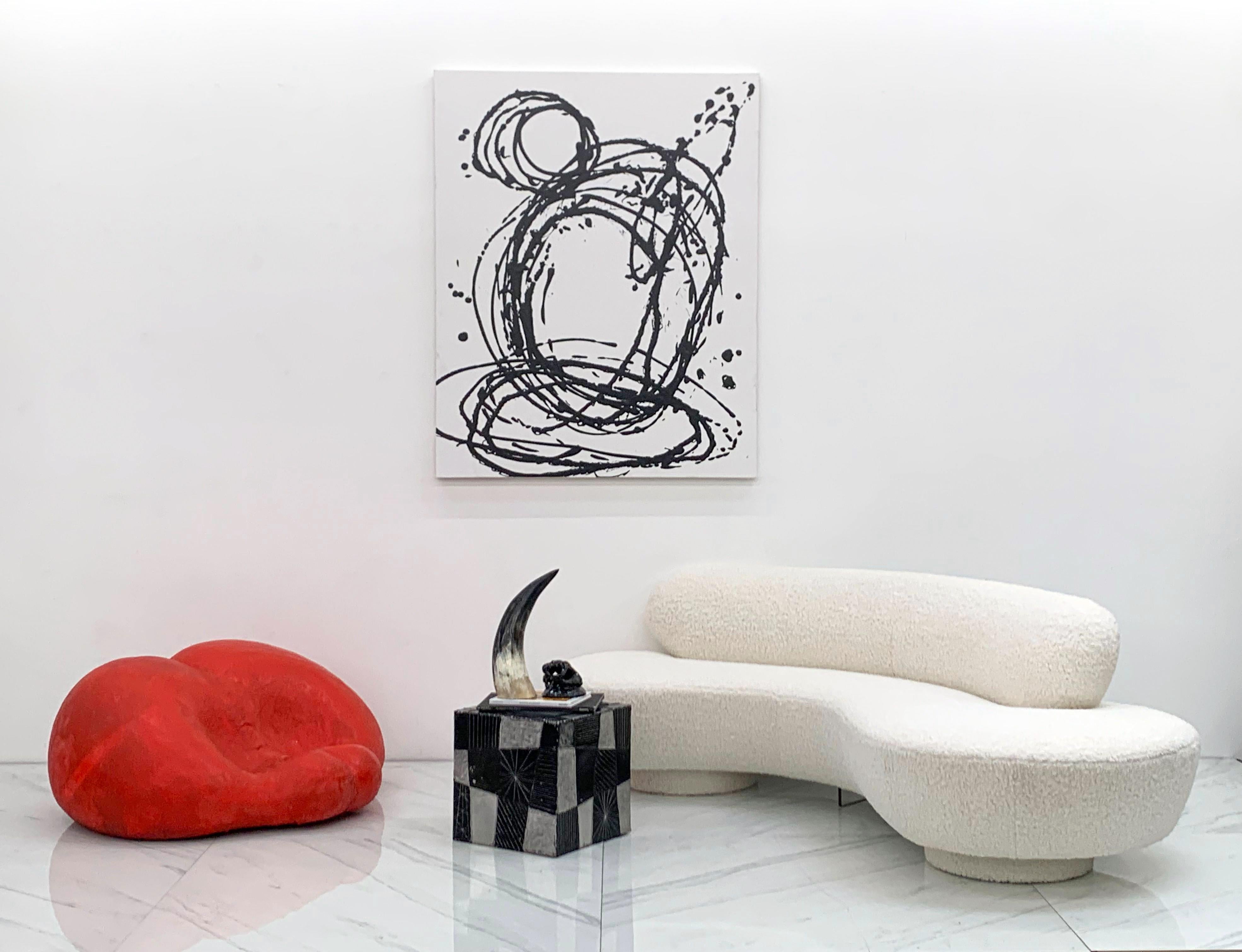 Designed and crafted by French Pop Artist, Luois Durot, this piece is sure going to be a conversation piece. Is it a tongue? Is it a bum? It's called the Pouffesses chair and it's definitely a fun piece that makes a bold statement in any