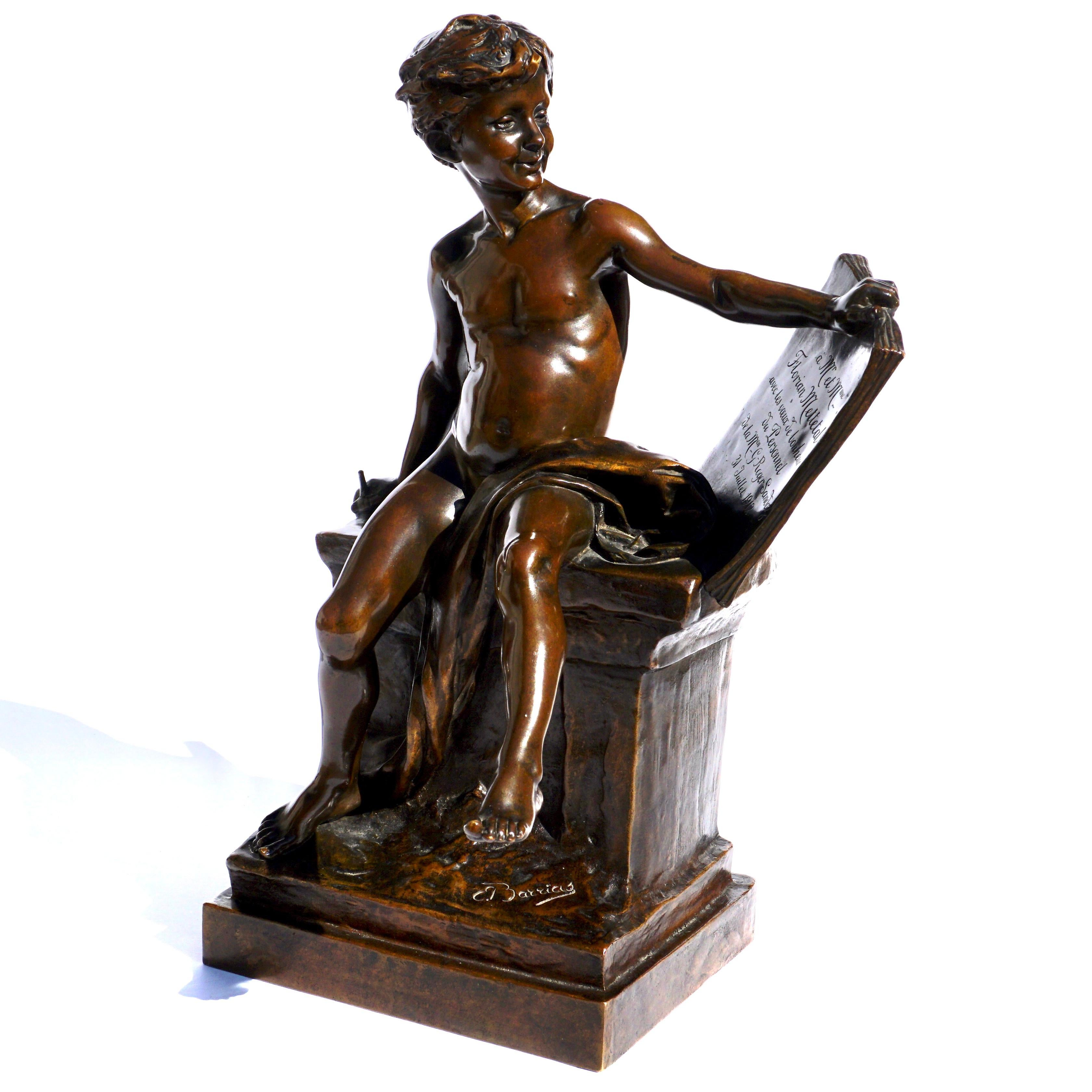 French dore bronze depicting a seated figure of a boy with tablet by Louis Ernest Barrias, French(1841-1905) Circa 1912 

Modeled as a partially nude youth seated with a tablet and pen, incised E. Barrias and Susse Frères and Susse Frères pastille