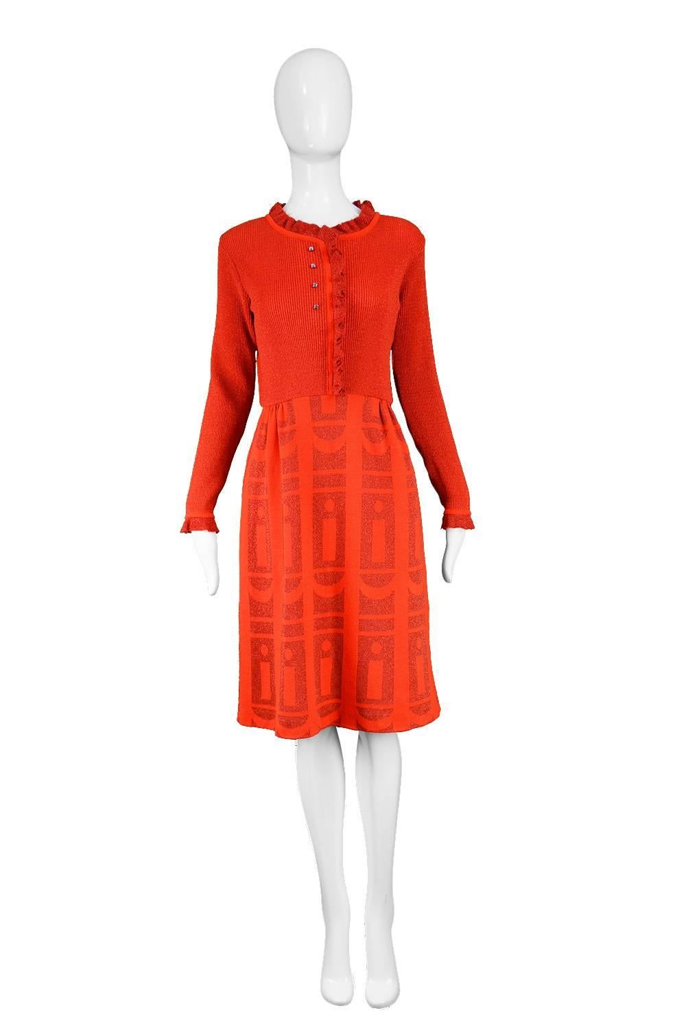 Louis Féraud for Rembrandt Vintage Red Lurex Long Sleeve Knit Dress, 1970s

Estimated Size: UK 10/ US 6/ EU 38. Please check measurements.
Bust - 34” / 86cm (has some stretch)
Waist - 27” / 68cm
Hips - up to 40” / 101cm
Length (Shoulder to Hem) -