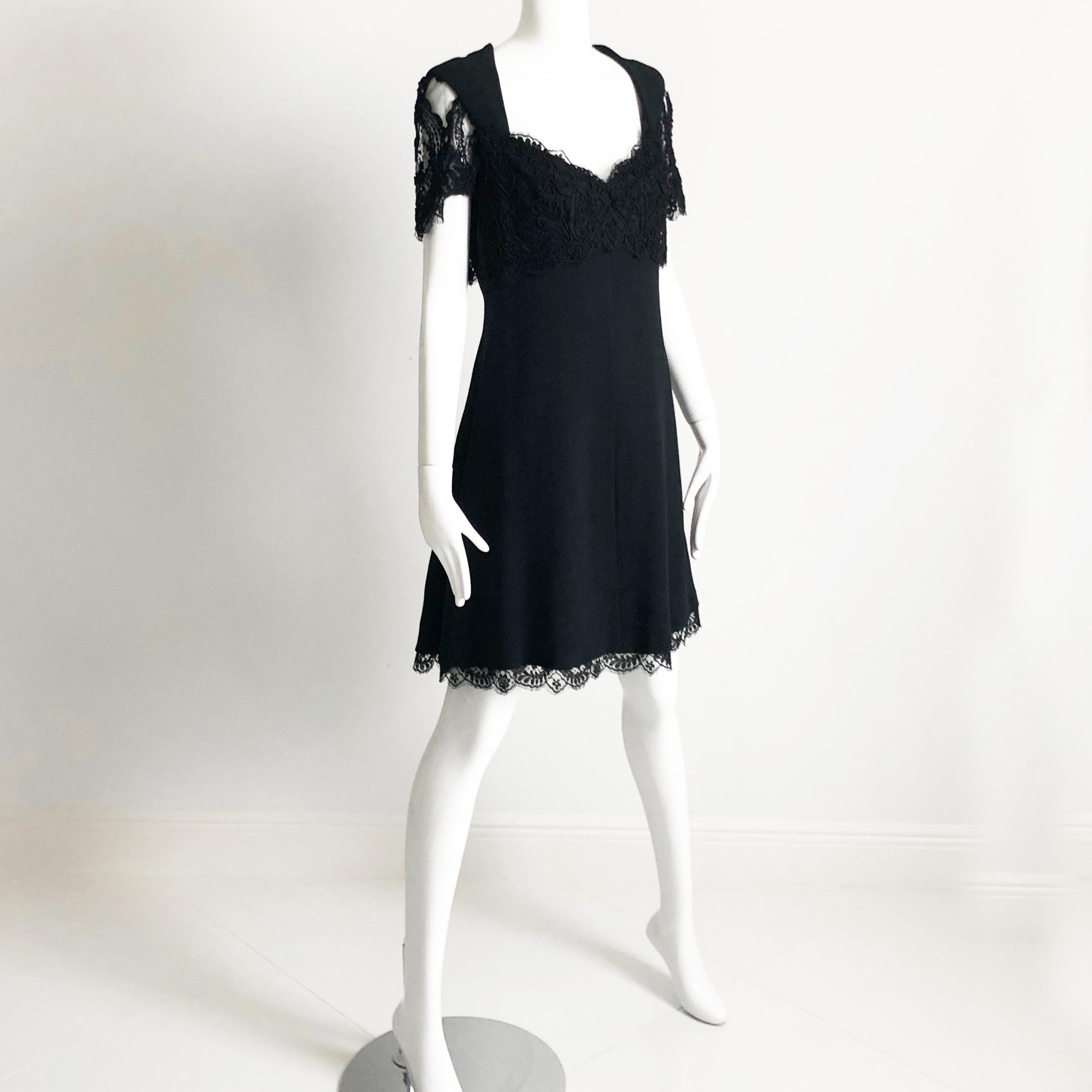 Preowned, vintage little black dress, designed by Louis Feraud, most likely in the late 80s or early 90s.  Made from black fabric it features a gorgeous scalloped lace panel across the front chest and back areas and lace sleeves and hem

The perfect