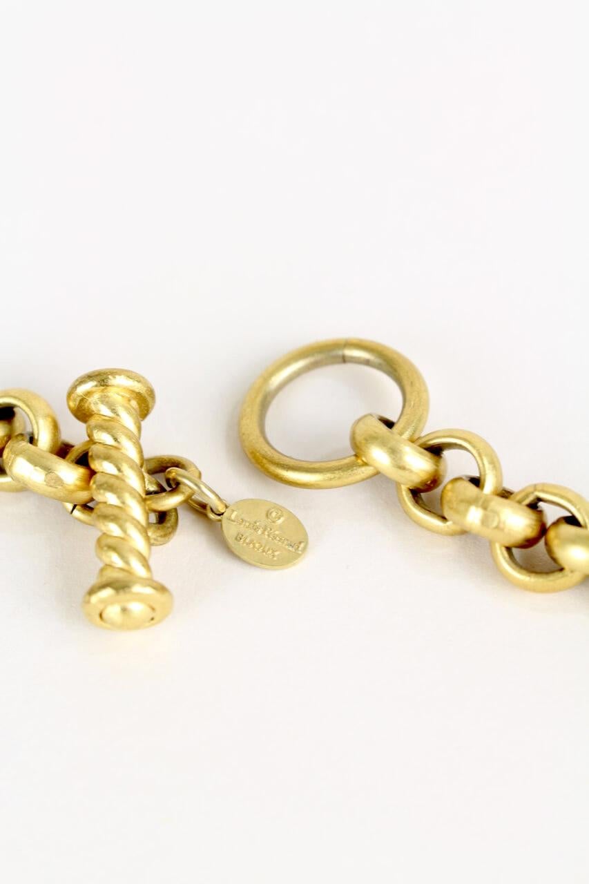 Women's or Men's LOUIS FERAUD Gold Tone Rhinestone Filled Charm Letters Necklace & Bracelet Set For Sale