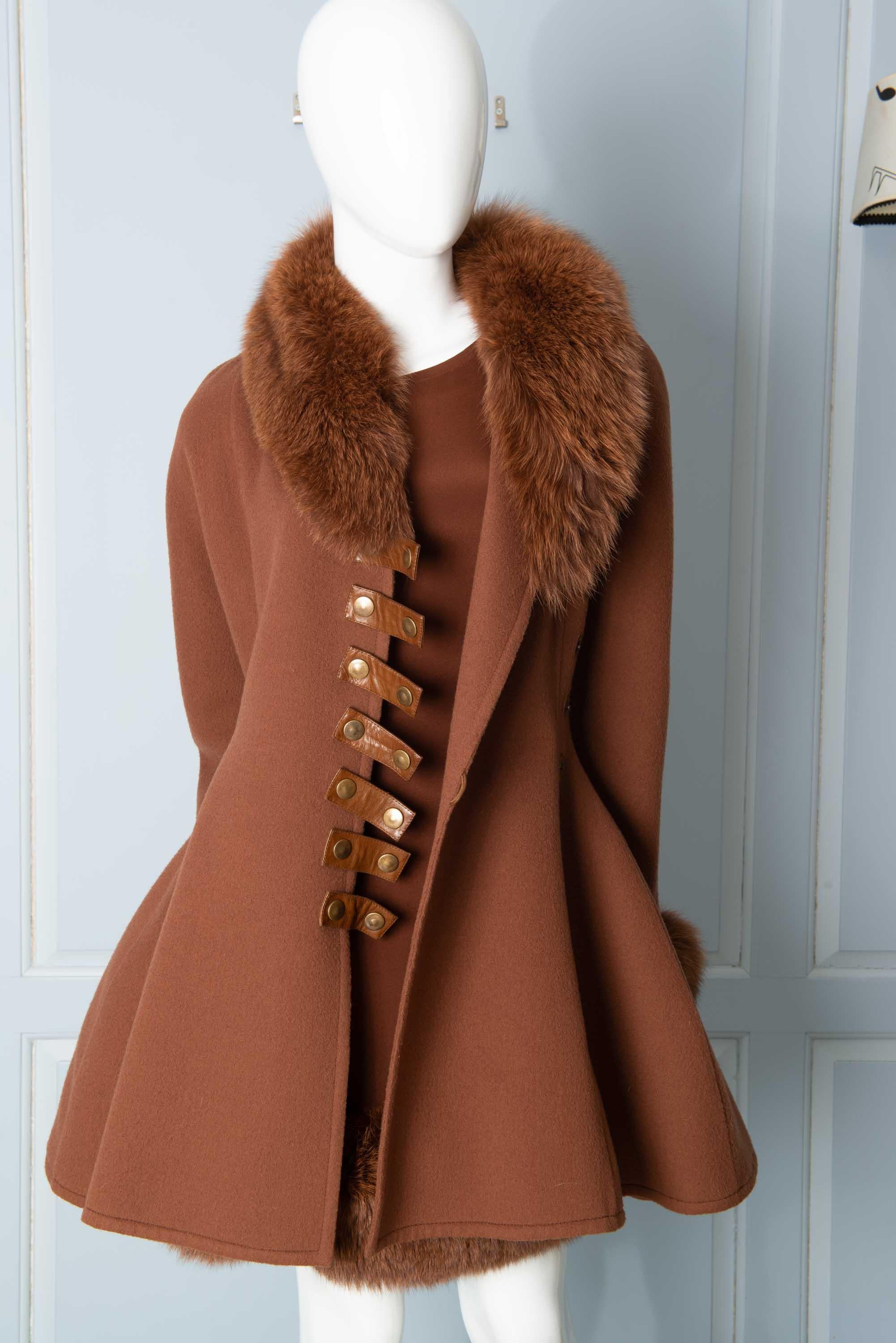 Haute Couture. Spectacular and timeless style. Similar to Christian Dior new look with the fitted waist and voluminous skirt of the coat. Also similar to Alaia skirt fullness. Cashmere coat has fox fur collar and cuffs. Silk dress has fox fur hem.