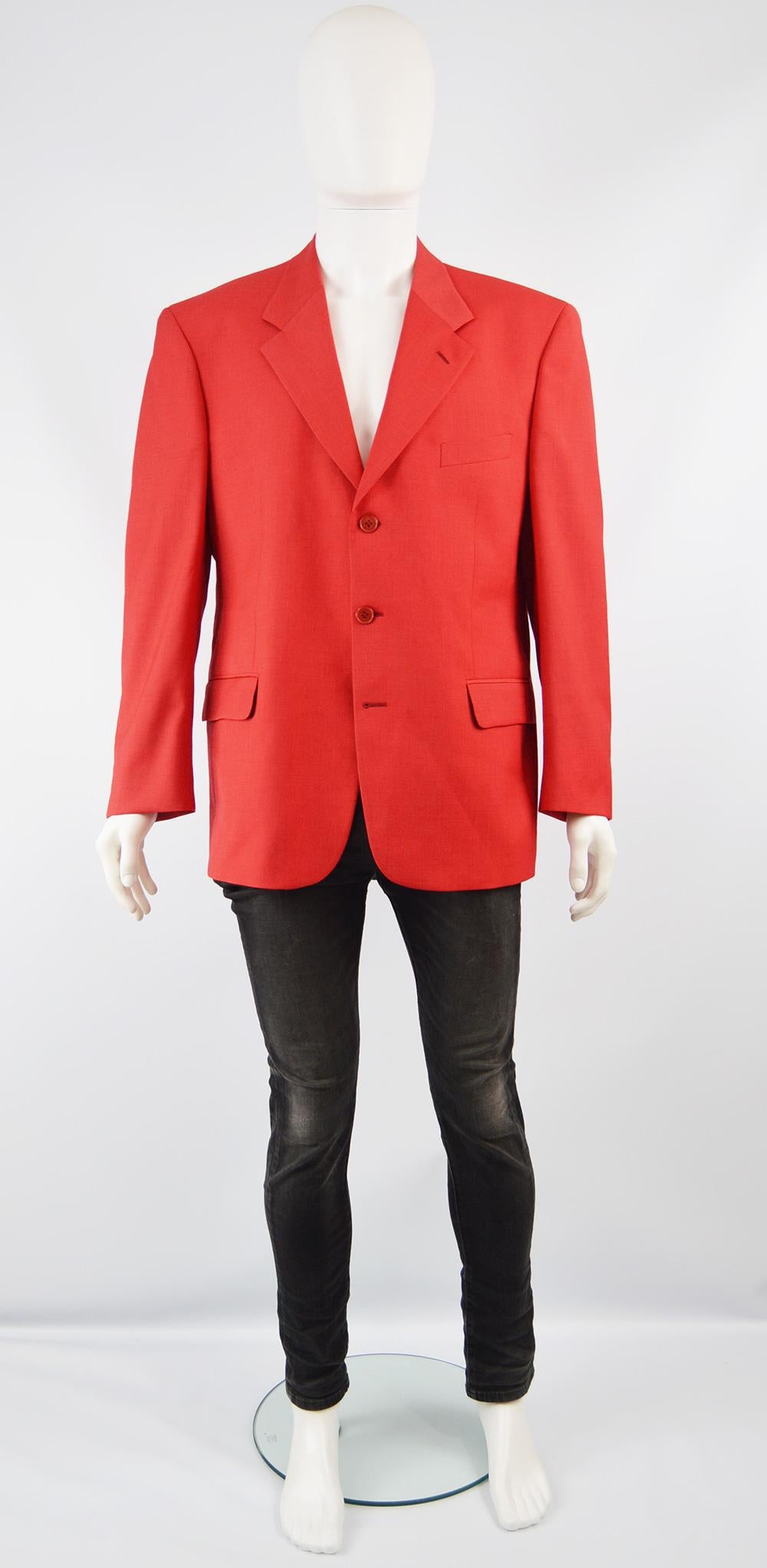 A bold yet classic vintage men's blazer jacket from the 90s by iconic French fashion house, Louis Feraud. In a bright red, suiting style worsted wool which is quite lightweight. This jacket was originally sold at luxury British department store,