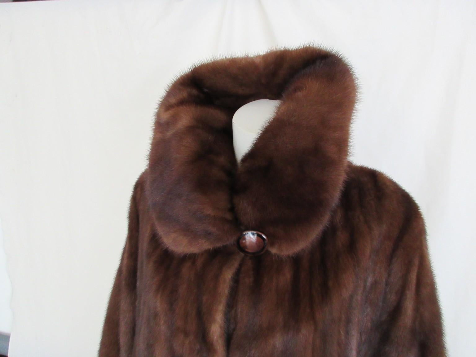 This long brown coat is made of quality mink fur.
Designer: Louis Feraud
These coats are rare to find!

We offer more exclusive fur items, view our frontstore

Details:
With 1 button at the collar, 3 closing hooks, 2 side pockets and 1 inside