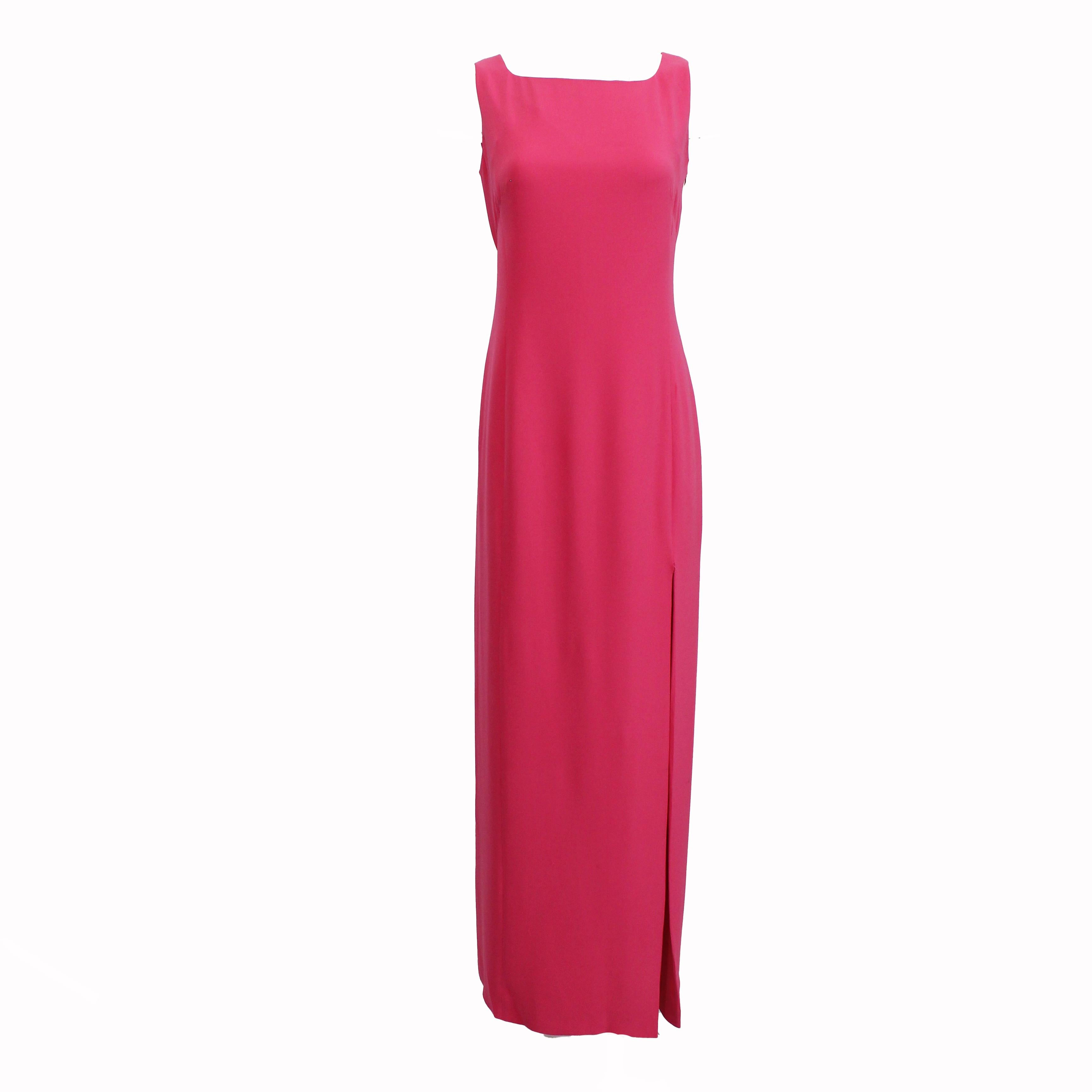 Preowned, vintage Louis Feraud silk evening gown, likely made in the 90s.   Made from pink silk, it features an elegant draped back and a high vent on the skirt - perfect for showing off a bit of leg.  

We love the simplicity of this design!