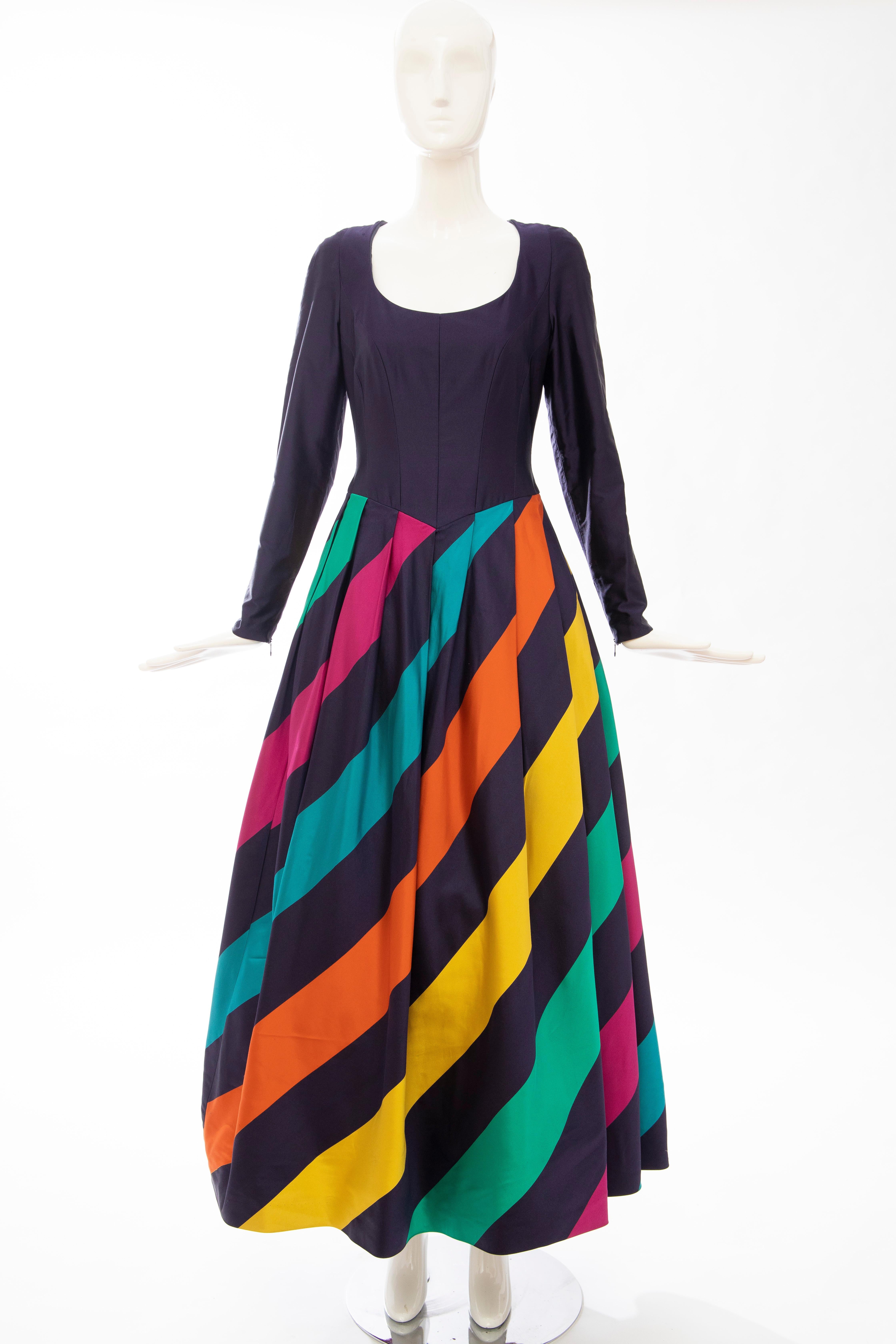 Louis Feraud, Circa: 1980's, silk faille eggplant polychrome striped evening dress, scoop neck, black tulle lining, concealed back zip closure and fully lined in silk.

No Size Label

Bust: 34, Waist: 27, Hip: 38, Length: 56
