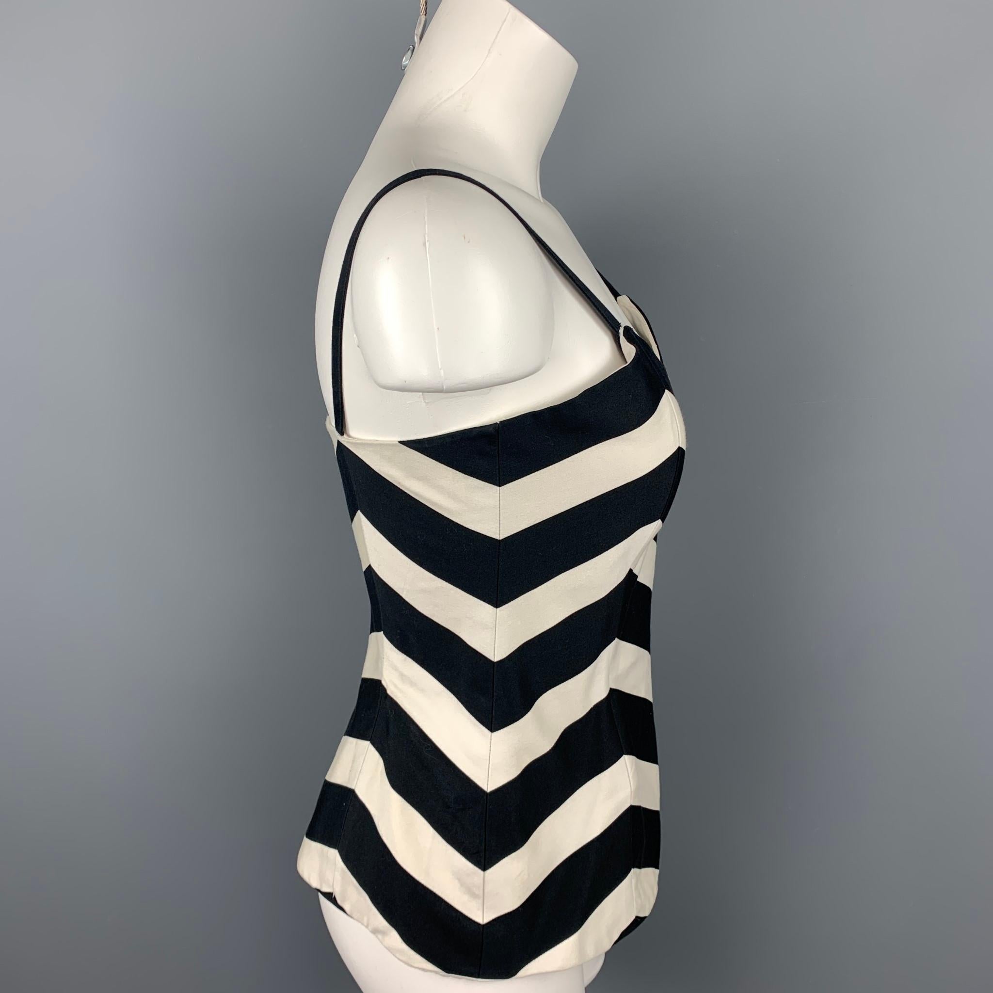LOUIS FERAUD bustier comes in a black & white chevron print cotton featuring a fitted style, spaghetti straps, and a side zipper closure. Discoloration on the back. 

Fair Pre-Owned Condition.
Marked: D 38 / US 8 / UK 12 / F 40

Measurements:

Bust: