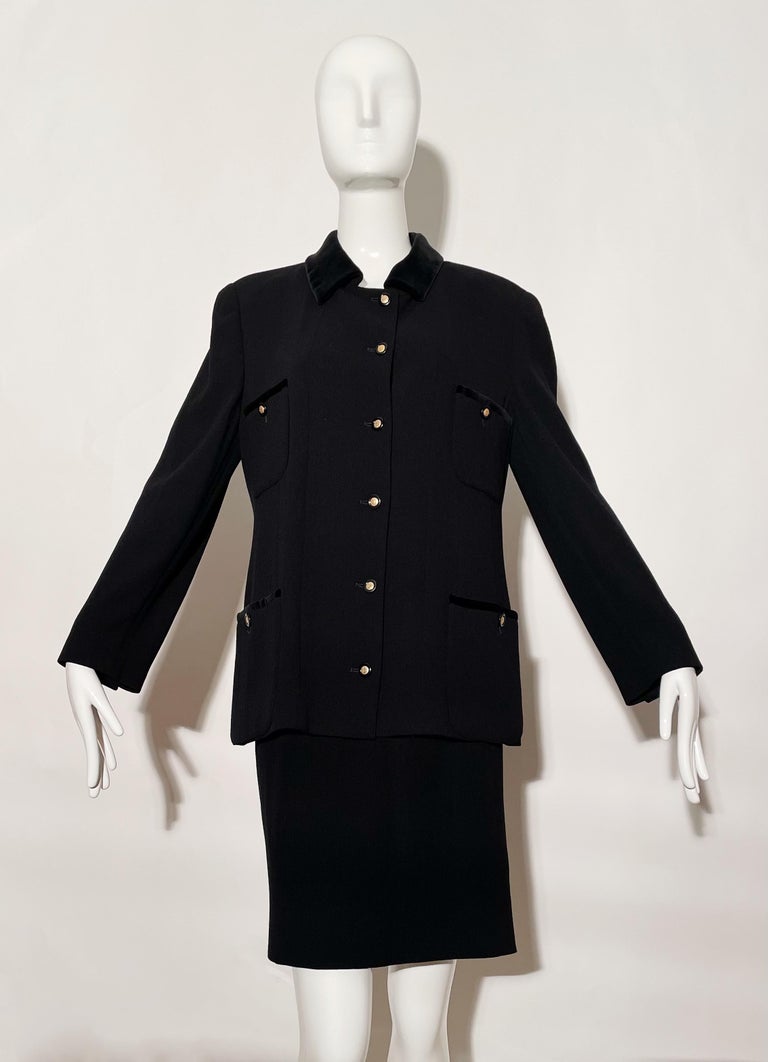 Black blazer and skirt suit. Front gold buttons. Front pockets. Velvet collar and trim. Shoulder  pads. Lined. Wool. Made in Slowenia.

*Condition: Excellent vintage condition. No visible Flaws.

Measurements Taken Laying Flat (inches)—
Shoulder to