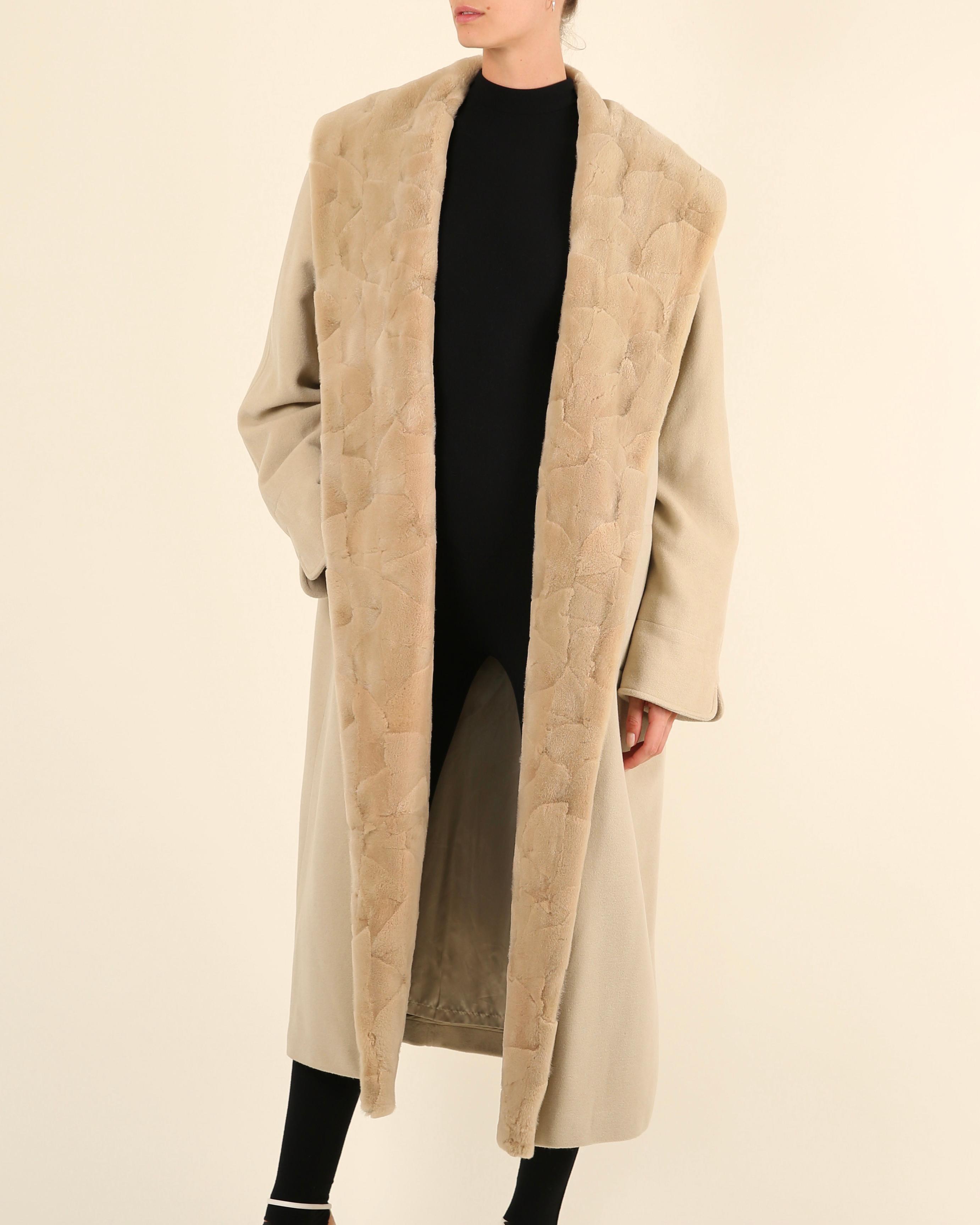 LOVE LALI Vintage

Louis Féraud vintage shawl fur collar coat in pale beige (sand)
Open oversized fit. Due to its cut this would work wonderfully for many sizes, depending on the desired fit. 
Lightly padded shoulders
Estimated to be from the late