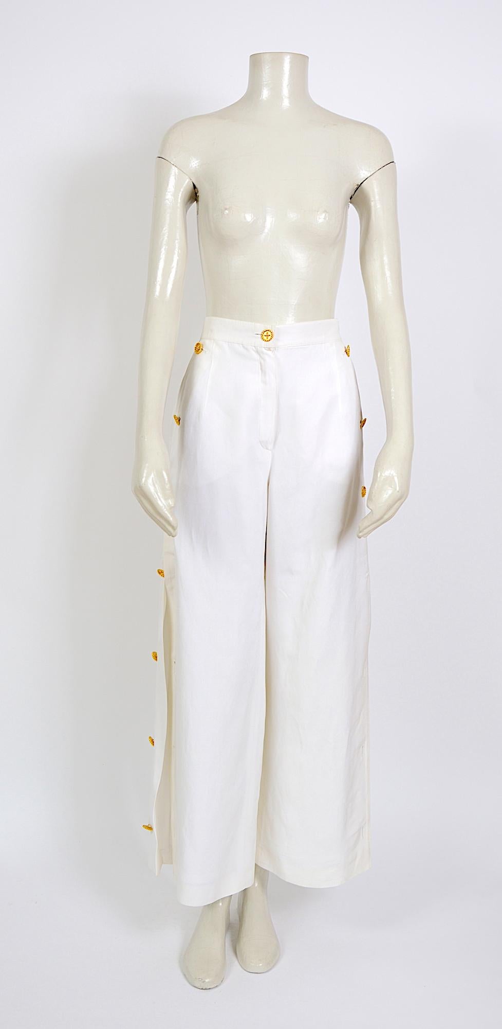 Louis Feraud white linen trousers designed to be worn open or closed with a series of gold buttons
Size:  French 40 - US 8 - UK 12 
Please use the measurements that are taken flat for the perfect fit:
Waist 14,5inch/37cm(x2) - Rize 14inch/36cm -