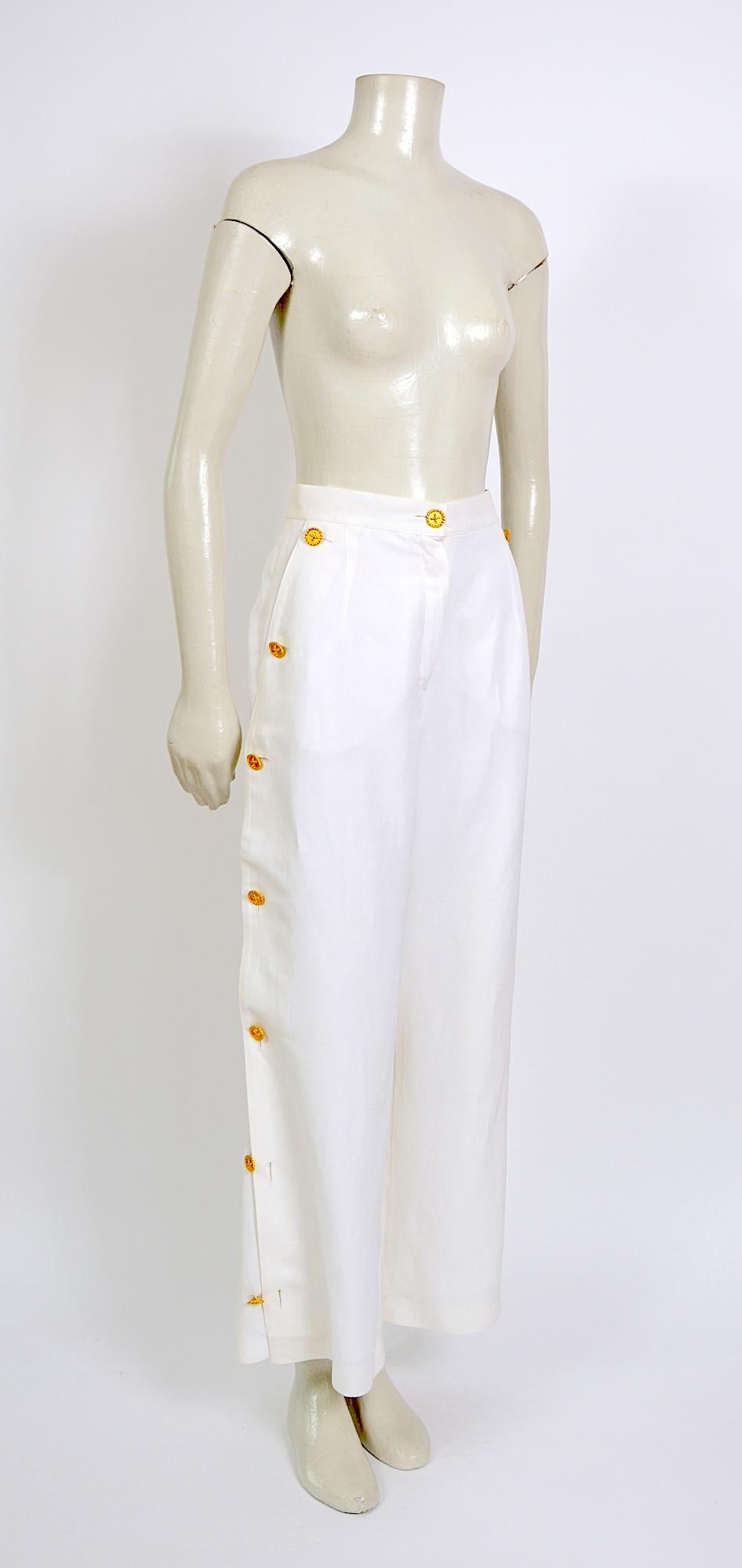 white trousers with gold buttons
