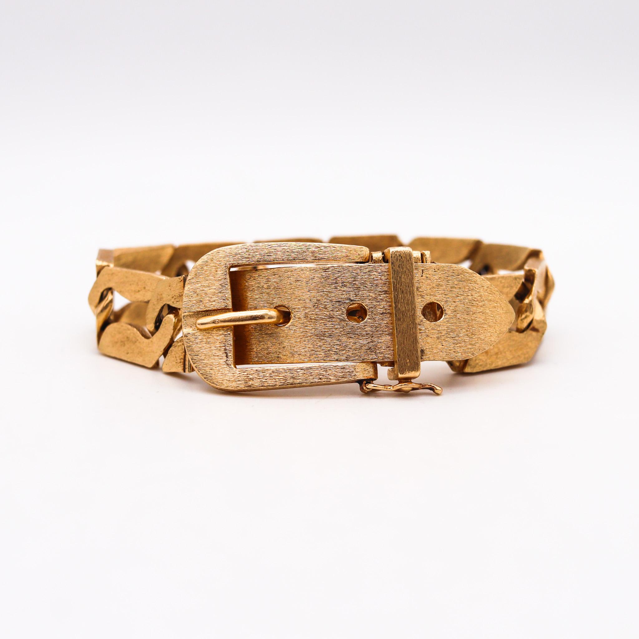 Buckle belt bracelet designed by Louis Fiessler.

An unusual buckle-belt bracelet, created by the famous German goldsmith and designer Louis Fiessler, back in the 1970's. This vintage bracelet was crafted in solid yellow gold of 14 karats with