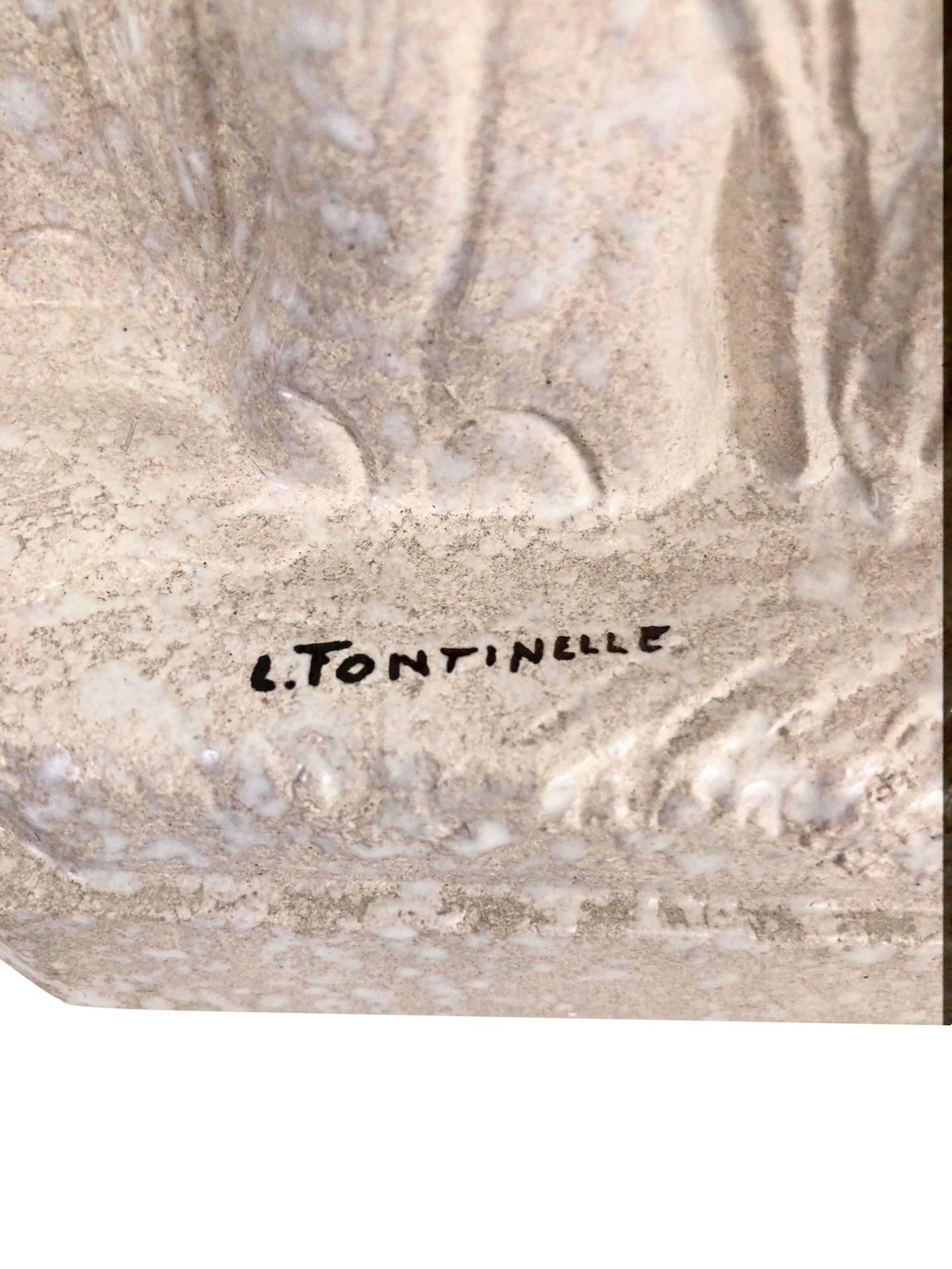 Cream glazed ceramic elephants by Louis Fontinelle (1886-1964).
Signed: L. Fontinelle
France, 1930s.

Dimensions:
Width 51 cm
Height 30 cm
Depth 8 cm.
 
