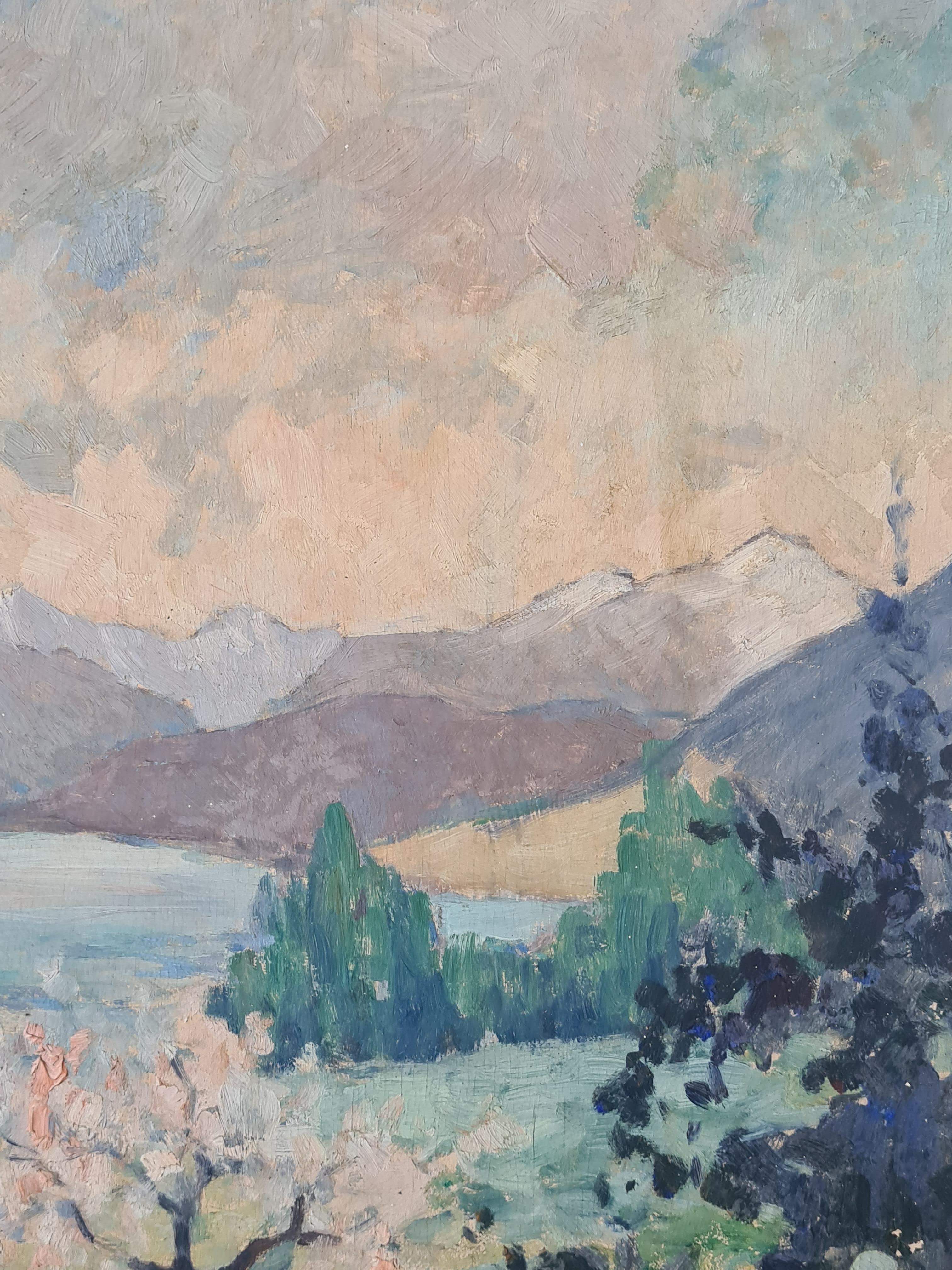 Paesaggio impressionista su tavola di Louis Francois Lachat dei primi del Novecento, raffigurante un melo in fiore. L'opera è firmata in basso a sinistra, titolata sul retro della tavola e presentata in una cornice in legno patinato.

Questo