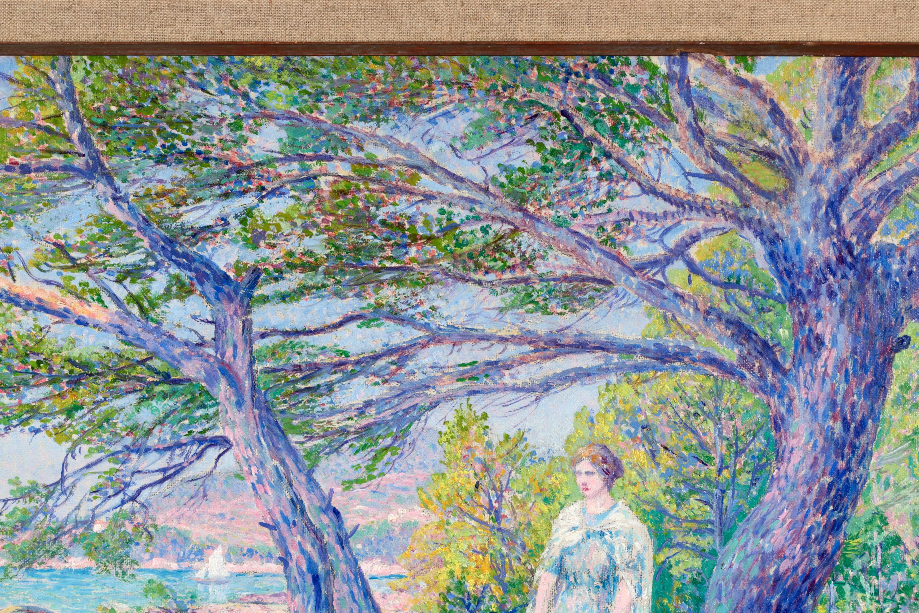 A wonderful pointillist oil on canvas circa 1910 by French neo-impressionist painter Louis Gaidan. The painting is beautifully and strikingly coloured and depicts a woman in a blue dress enjoying a walk on a dirt path in the shade of trees by the