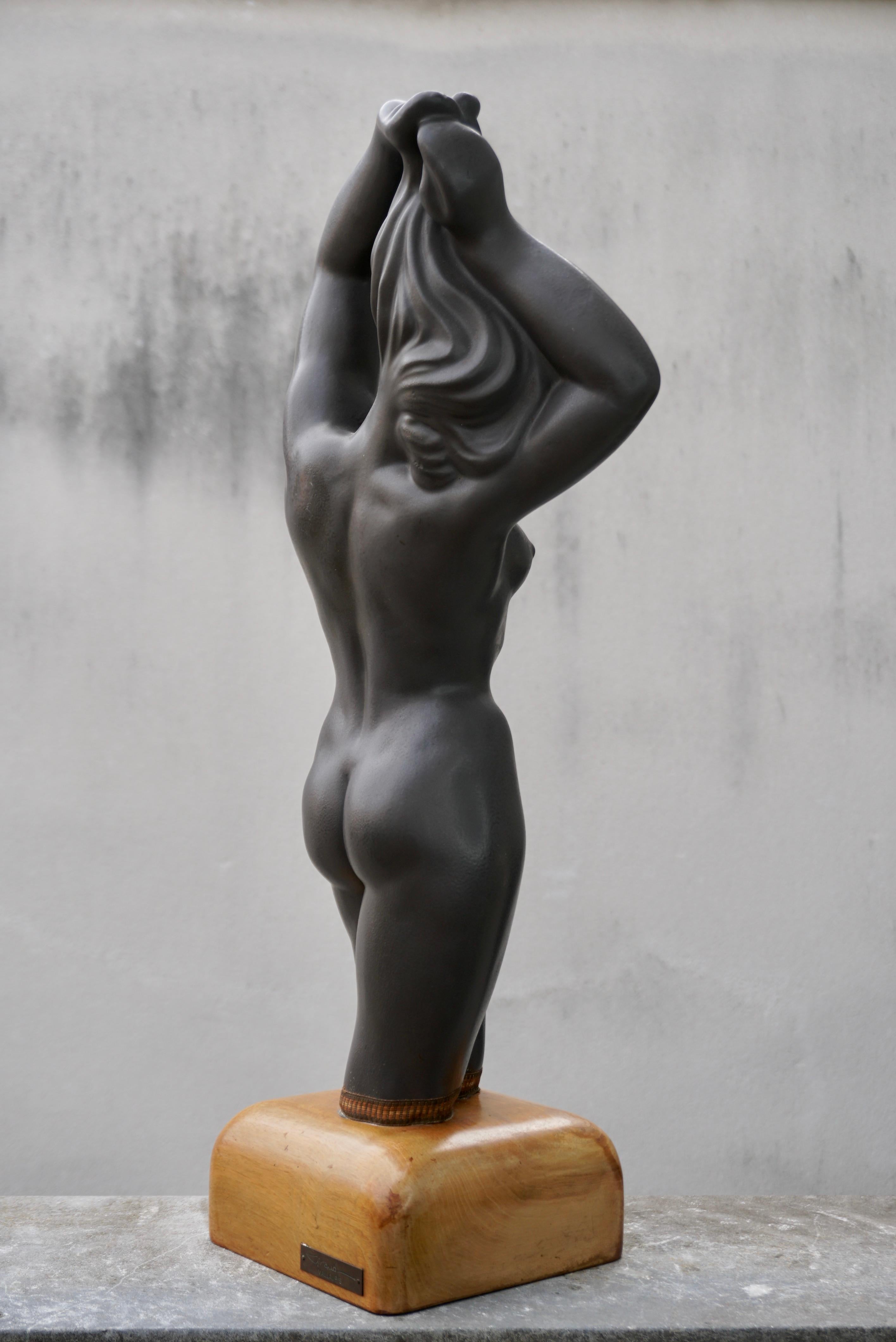 Louis Giraud to Vallauris France sculpture

' Swimmer ' in grey ceramic original base in wallnut  signed  Giraud Vallauris

20th century circa 1940

Dimensions
62 cm x 28cm x 18 cm