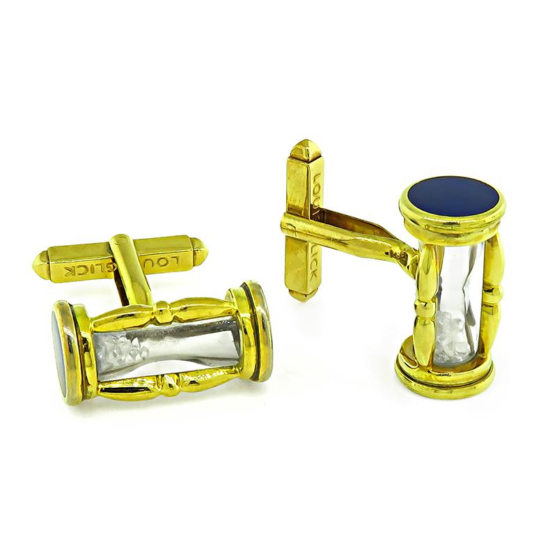 This is an elegant pair of 18k yellow gold enamel cufflinks by Louis Glick. The cufflinks feature hour glass design with diamond in the rough inside. The head of the cufflinks measure 10mm by 20mm and weigh 17.3. The cufflinks are signed LOUIS