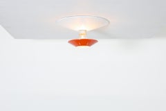 Louis Kalff Vibrant Red and White Enameled Metal Ceiling Rondelle for Philips