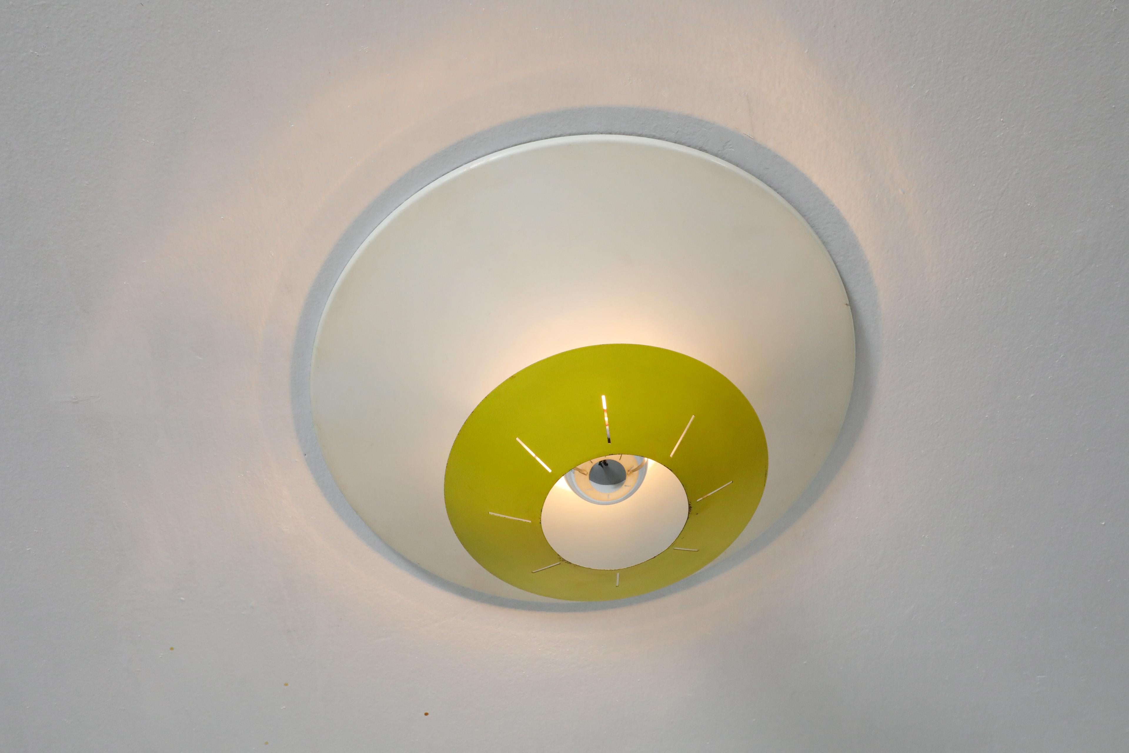 Louis Kalff Yellow and White Enameled Metal Ceiling or Wall Lamp for Philips In Good Condition For Sale In Los Angeles, CA