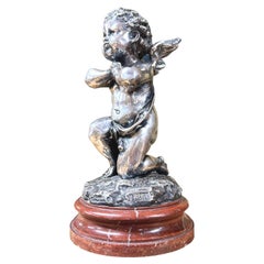 Louis Kley – Bronze mit Amor mit silberner Patina, datiert 1877