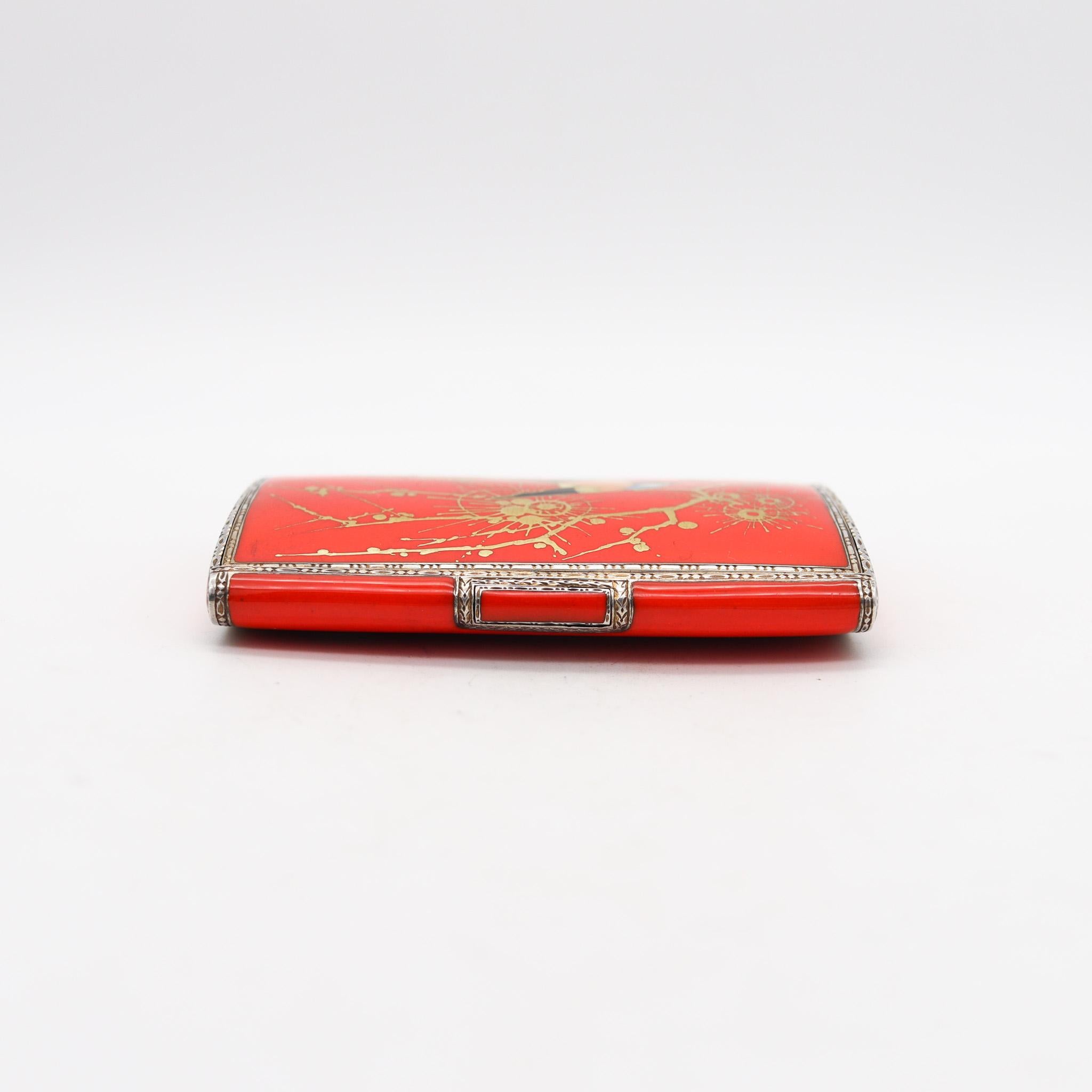 Chinoiserie orange enameled box by Louis Kuppenheim.

Outstanding rare box, created during the art deco period in the city of Pforzheim Germany, back in the late 1930. This wonderful box is closely to mint condition, designed with cushioned shapes