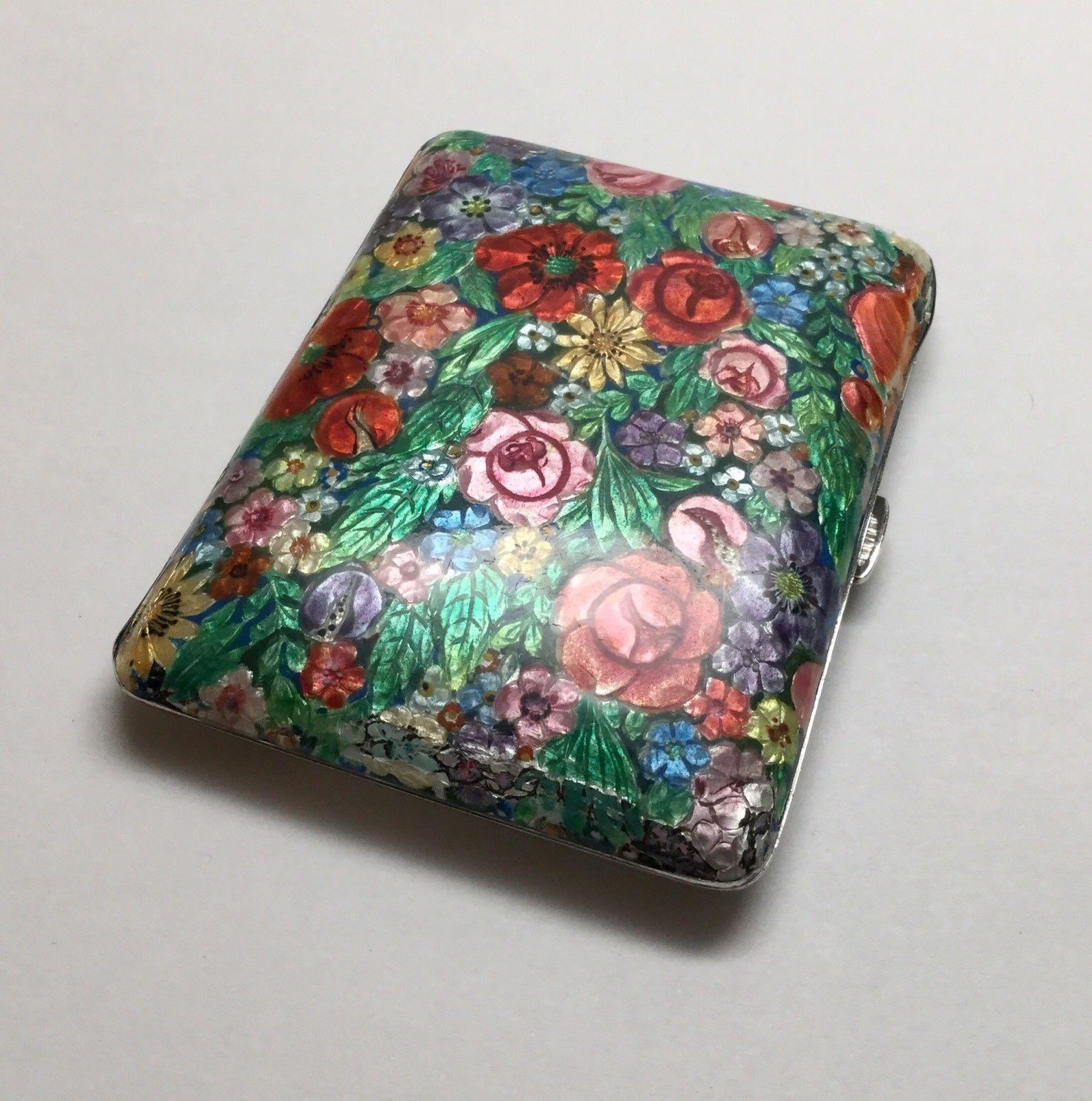 Vintage Louis Kuppenheim silver and floral enamel cigarette case with gold washed interior. Marked: initials, German mark, 900, #584, circa 1900-1940. Pforzheim, Germany. Measures: 3 1/2