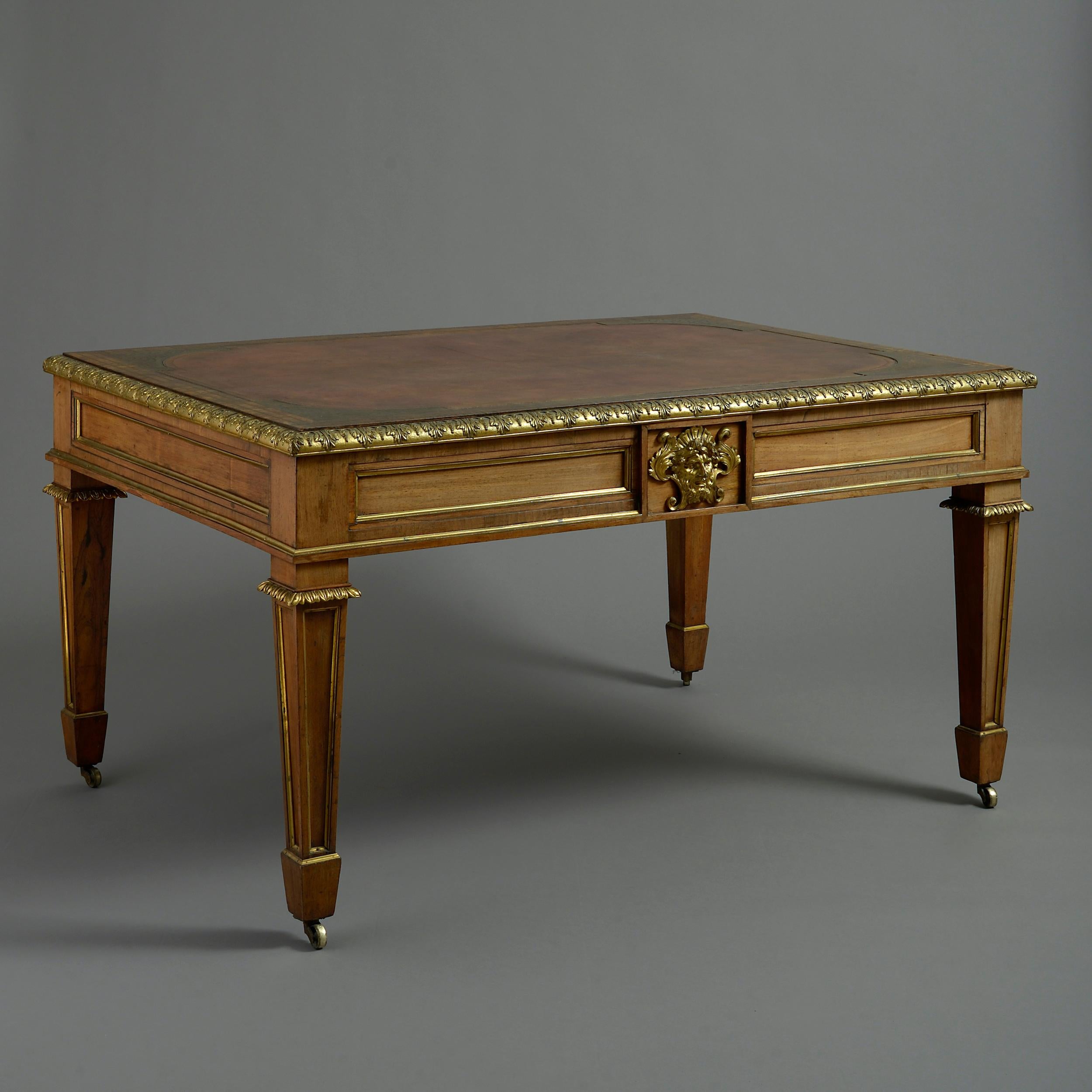 Table d'écriture Régence en bois de rose monté en bronze doré, attribuée à Louis Le Gaigneur, vers 1820.