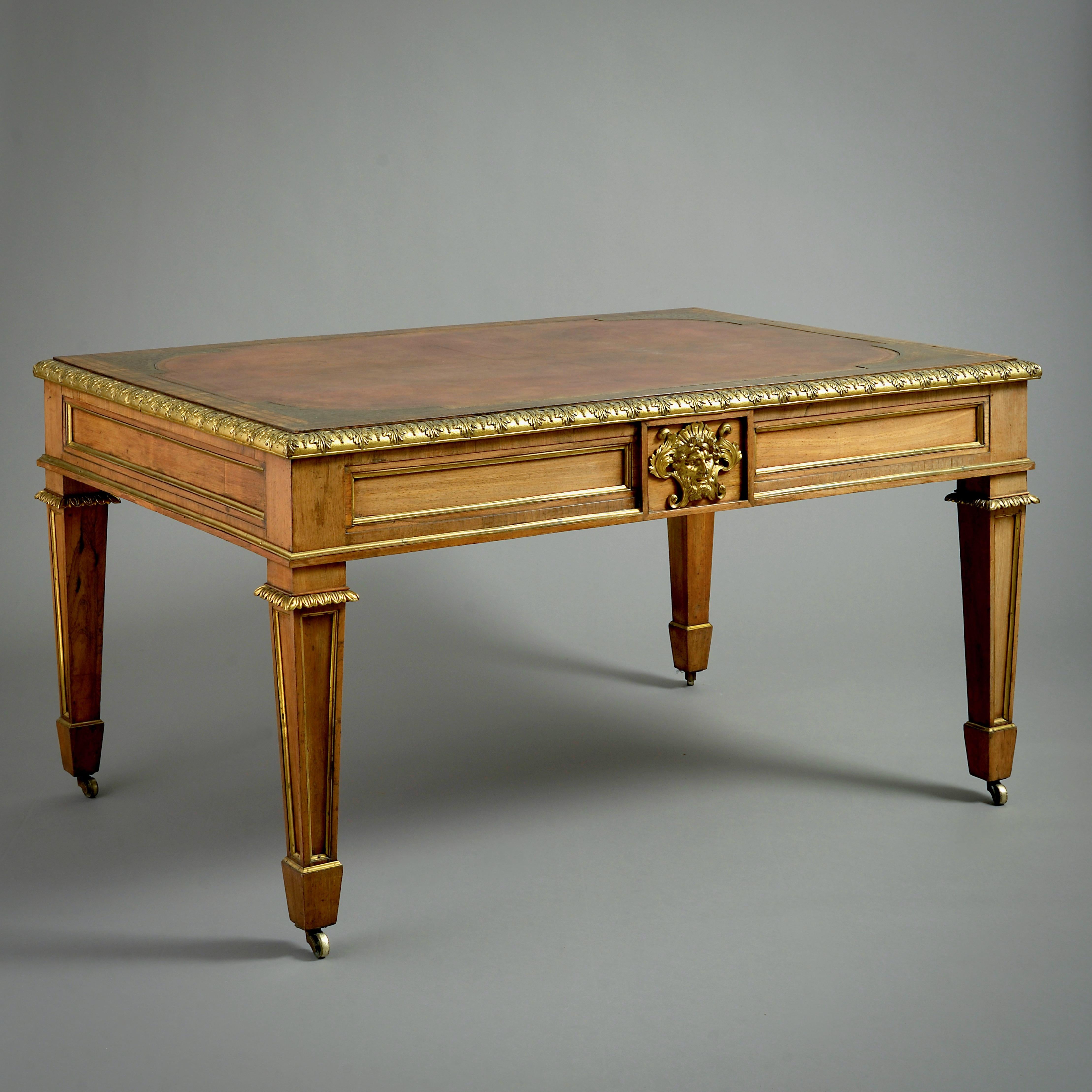 Table d'écriture Régence en bois de rose monté en bronze doré, attribuée à Louis Le Gaigneur, vers 1820.