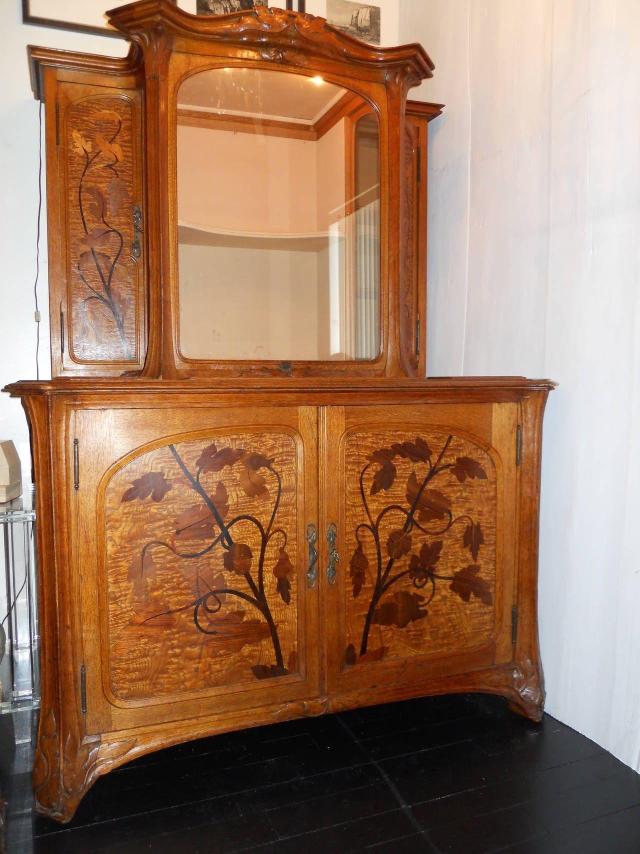 Marvelous Louis-Maurice-Alphonse Herold carved and inlaid walnut Marquetry Collector's Cabinet. The middle part lifts up for storing objects, as shown on one of the pics. The middle part behind the glass also lights up with a manual switch nine also