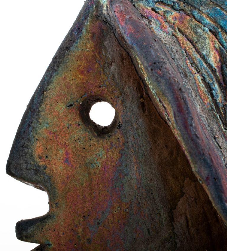 Louis Mendez (American, 1929-2012), Studio Art Pottery Sculpture of a Kissing Couple, raku-fired with an iridescent glaze, signed on base.

Dealer: S138XX