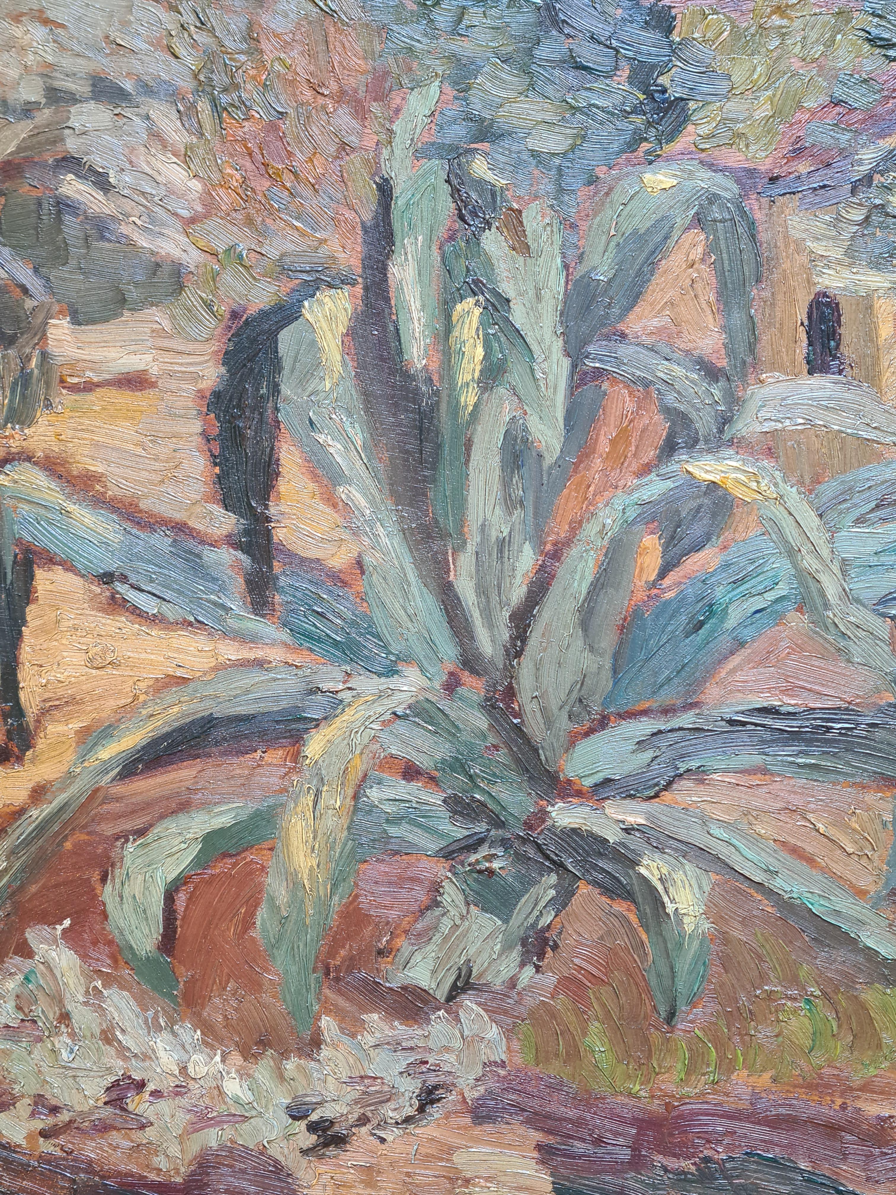 Huile sur panneau représentant une agave bleue dans son paysage, par l'artiste français Louis Michel Bernard. Signé en bas à droite et avec le cachet de l'atelier au dos du panneau. Présenté dans un cadre en bois sculpté, gesso, feuille d'argent et