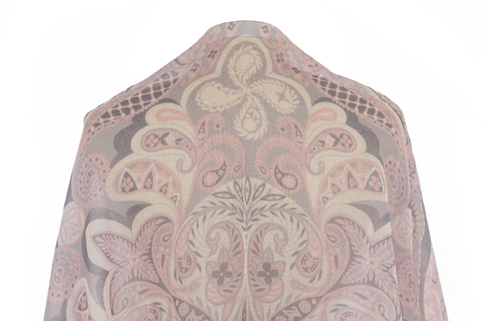 Louis Vuitton cashmere and wool mix shawl with a floral print and paisley in rosé and grey. The piece is in excellent condition.