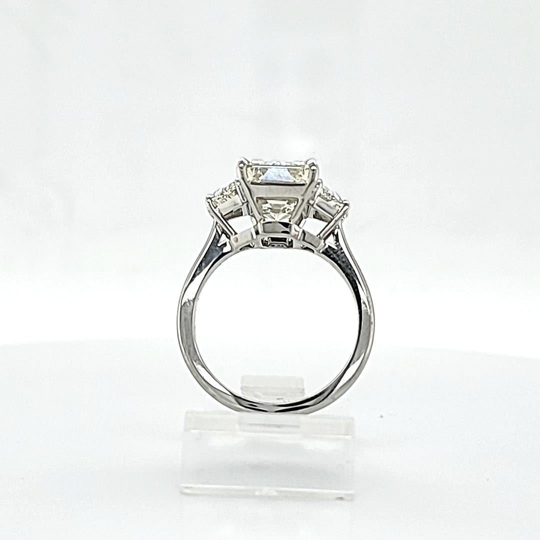 Women's Louis Newman & Co 4.05 carat Emerald Cut GIA certified Diamond Three Stone Ring
