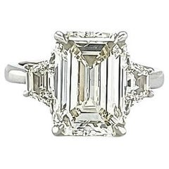 Louis Newman & Co, bague à trois pierres en diamants certifiés GIA de 4,05 carats taille émeraude