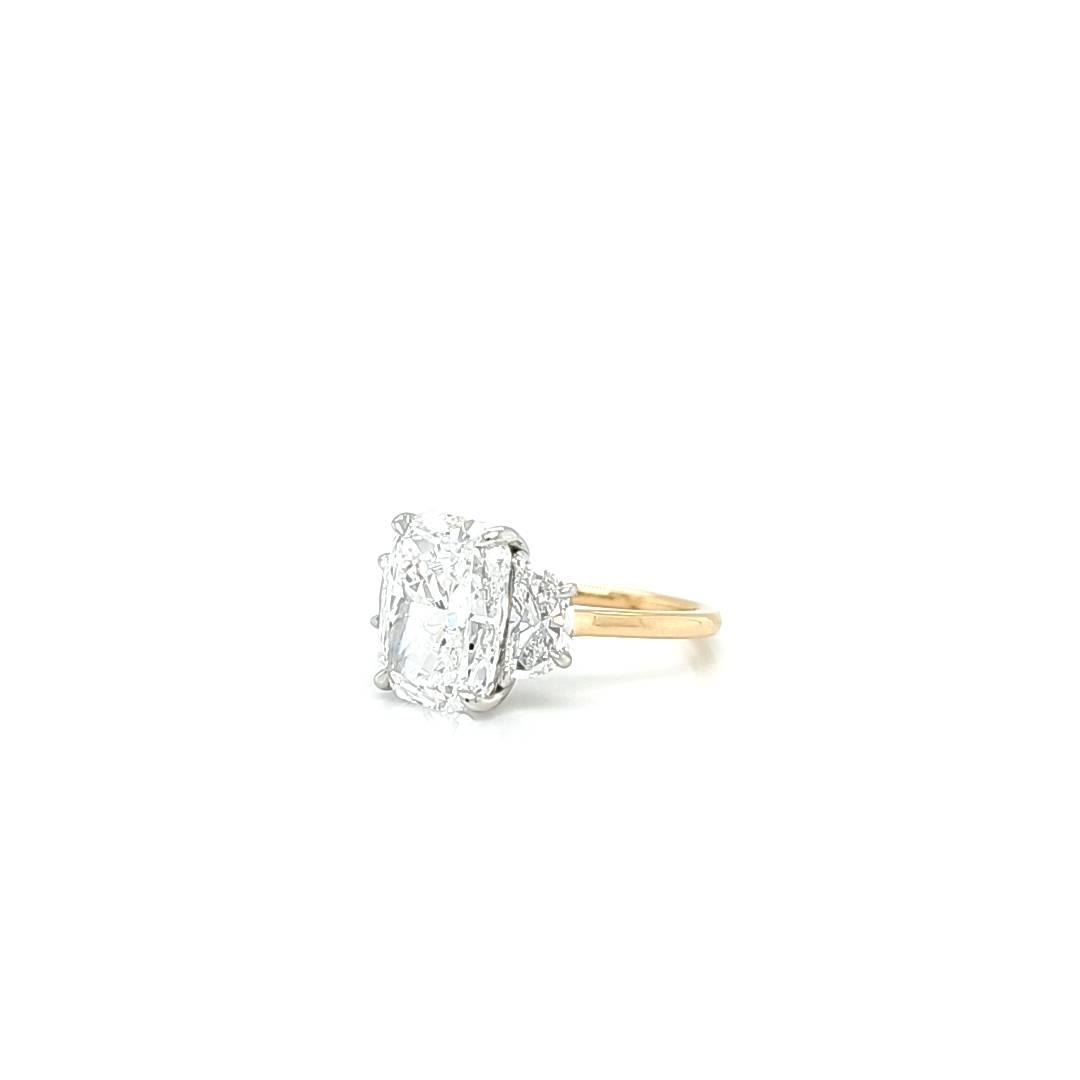 Cushion Cut Louis Newman & Co 4.27 carat Elongated Cushion GIA Cert Diamond Three Stone Ring For Sale