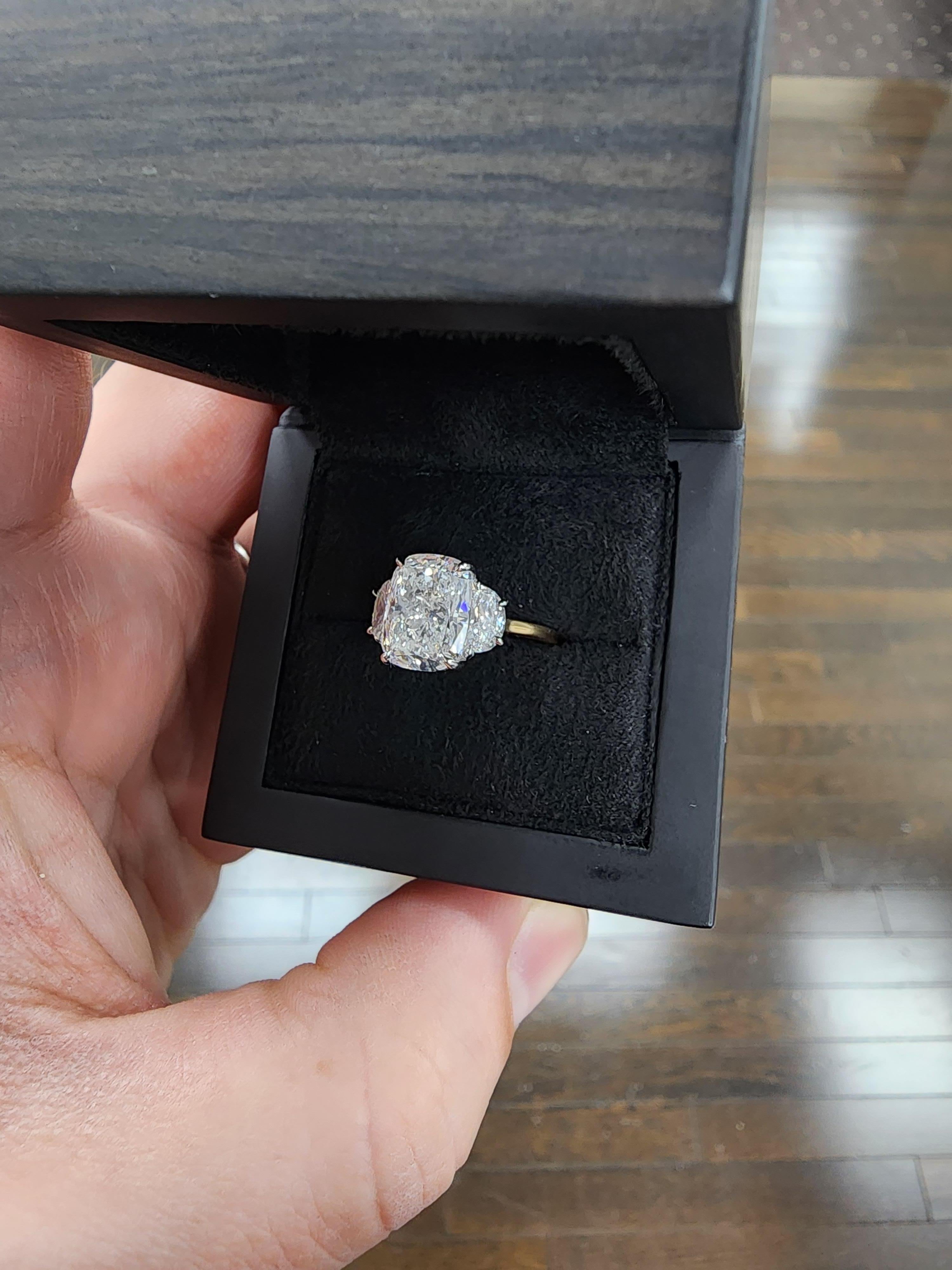 Louis Newman & Co 4.27 carat Elongated Cushion GIA Cert Diamond Three Stone Ring For Sale 2