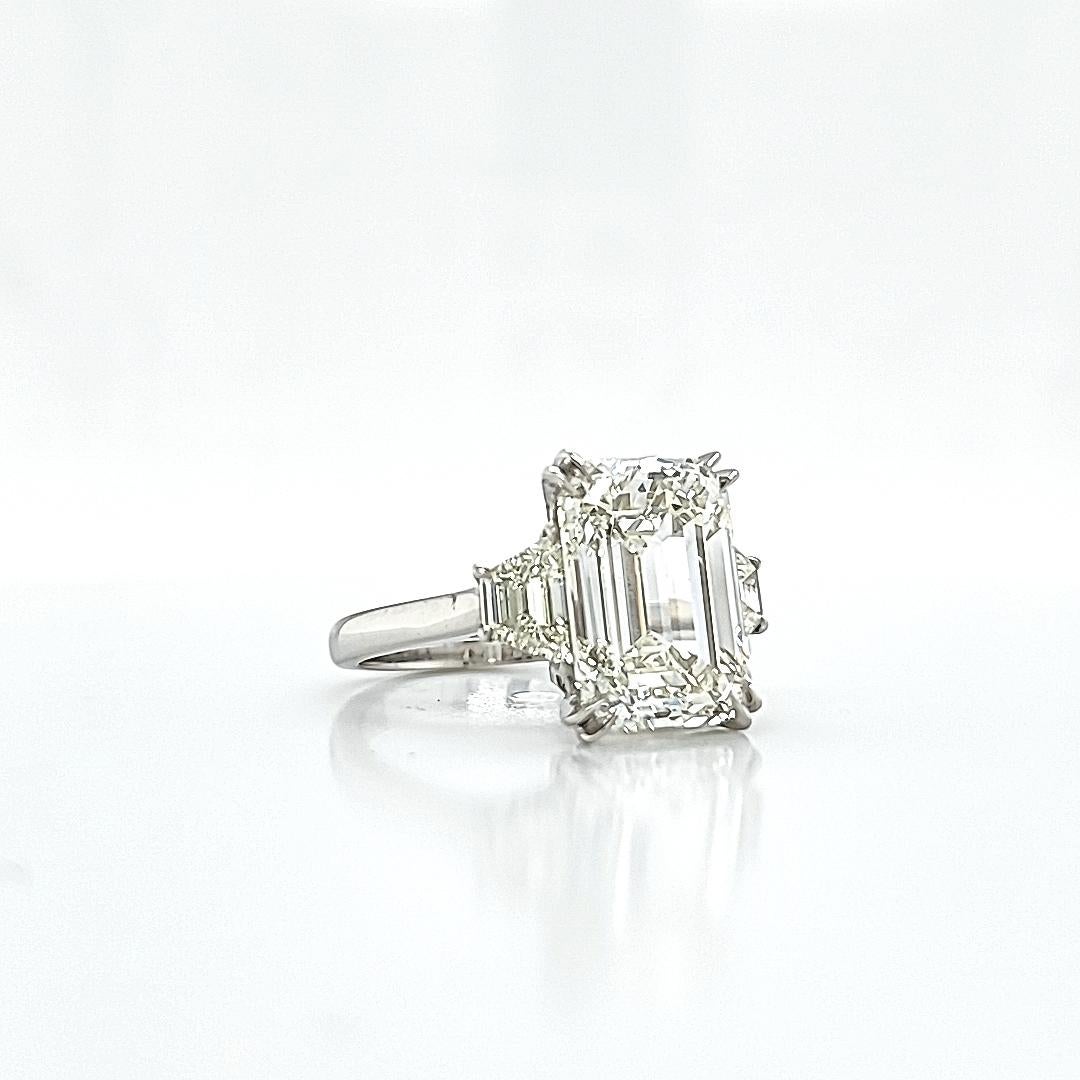 Louis Newman & Co 7.02 carat Emerald Cut GIA certified Diamond Three Stone Ring In New Condition In New York, NY