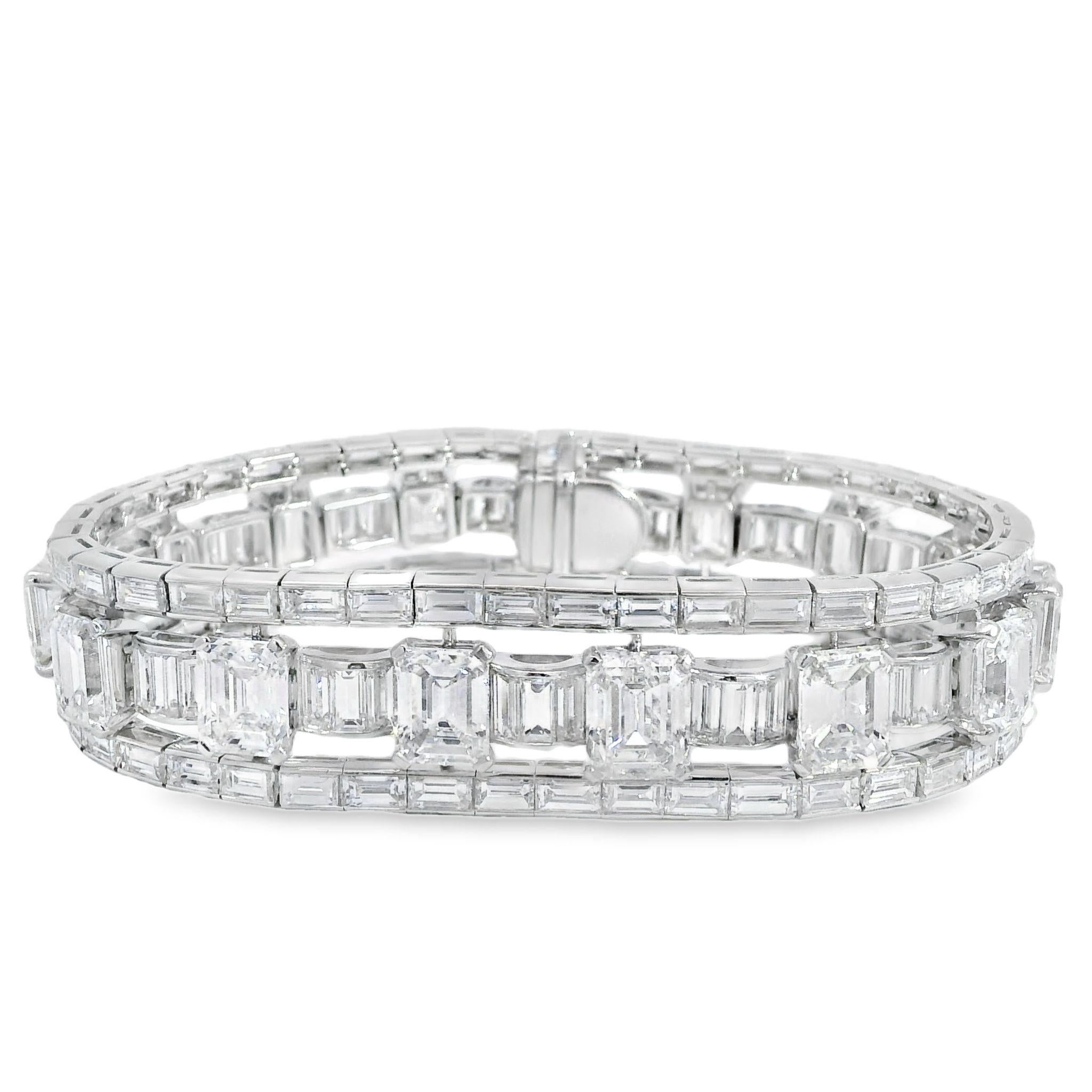 Hand made platinum one of a kind bracelet with 38.03 carats of natural diamonds. 15 Emerald Cut Diamonds with GIA certificates weighting 21.49 carats total. The ends of the bracelet have 1 carat Emerald Cuts and graduate up to a 2.33 carat Emerald