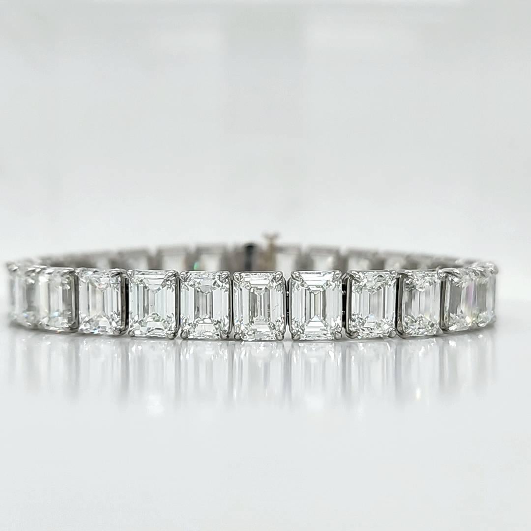 a one of  a kind creation that took us months to make. Every stone is a GIA certified Emerald cut diamond weighing 1.50 carats. 28 diamonds weighing 42.10 carats total. Every stone is I/J in color and Clarities range from VVS to VS to two stones