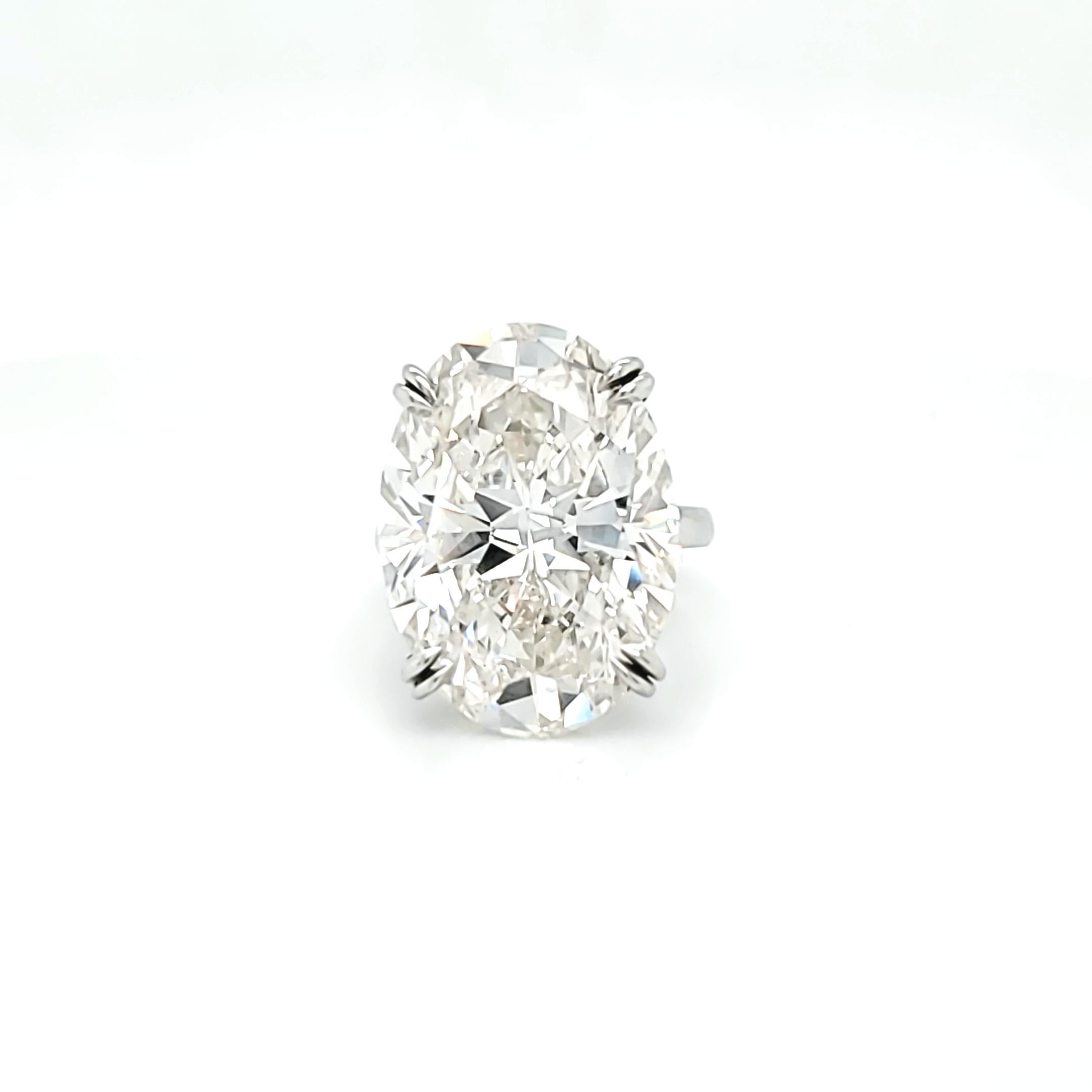 GIA certified 23.88 carat I color VVS2 Clarity Oval Cut Diamond. Set in a handmade solitaire band. Finger size is currently 6.5 but can be adjusted as needed. We can include a setting of your choice for this item Up to $15,000 value.