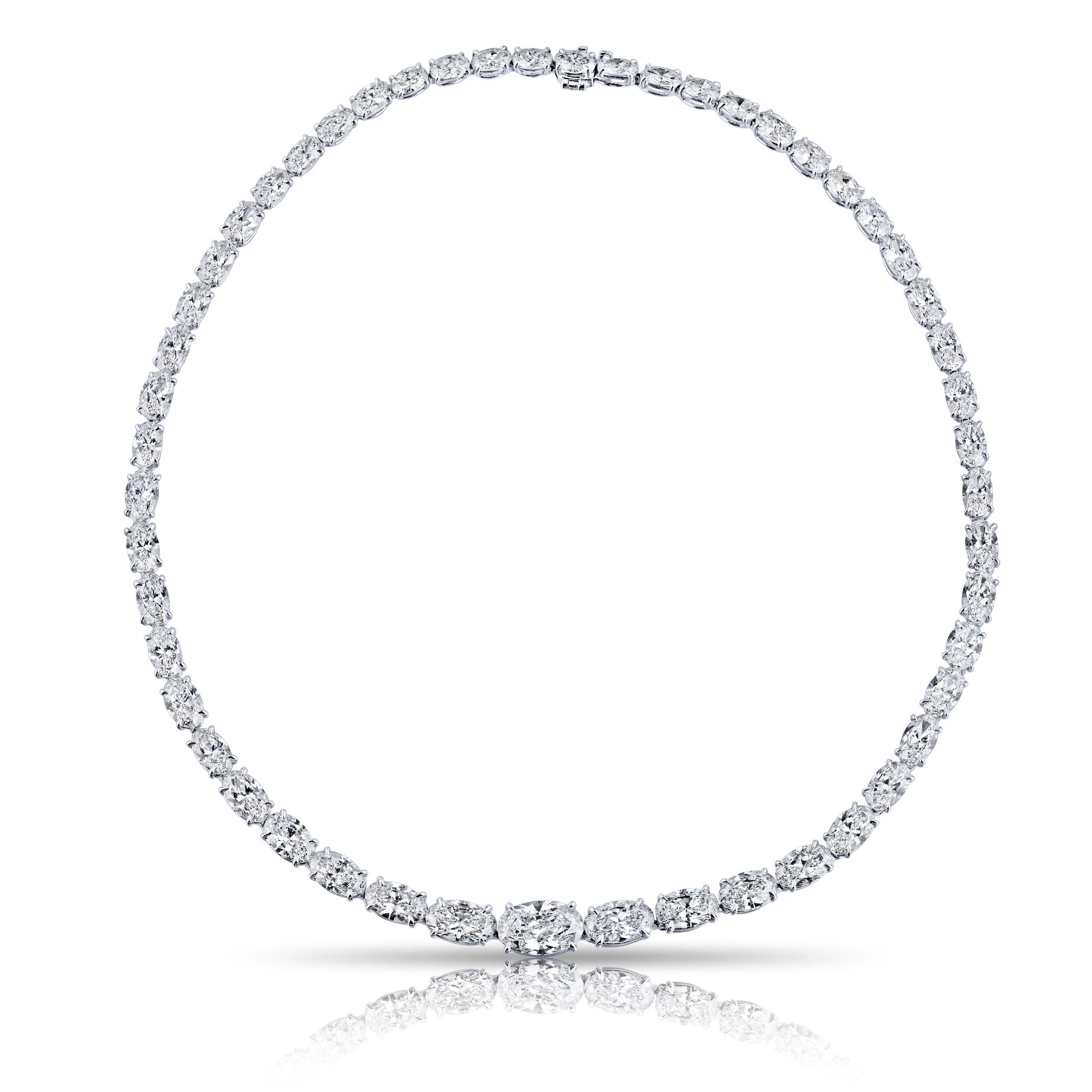 A Louis Newman & Company masterpiece! After months in the making we finally completed this one of a kind Oval Cut  Diamond Riviera Necklace. 34.71 carats of perfectly cut oval cut diamonds. The center stone is a GIA certified 3.15 carat D color Si