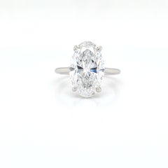 Louis Newman & Co GIA certified 5 carat Elongated Oval Diamond Solitaire Ring