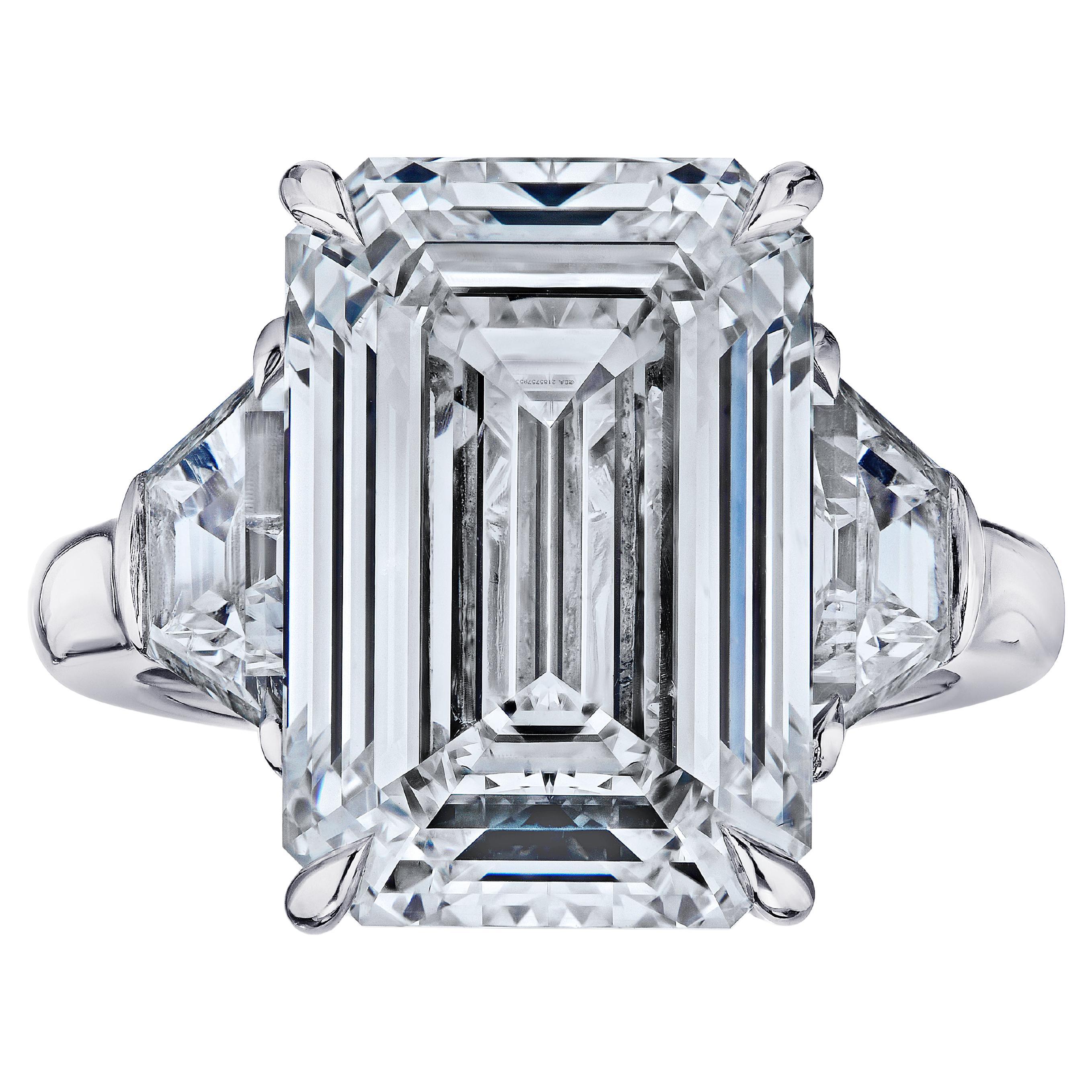 Louis Newman 
Co GIA Certified 5.01 Carat Emerald Cut Diamond Three-Stone Ring