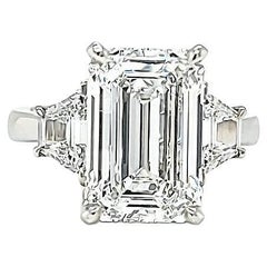 Louis Newman & Co GIA Certified 5.01 Carat Emerald Cut Three Stone Ring