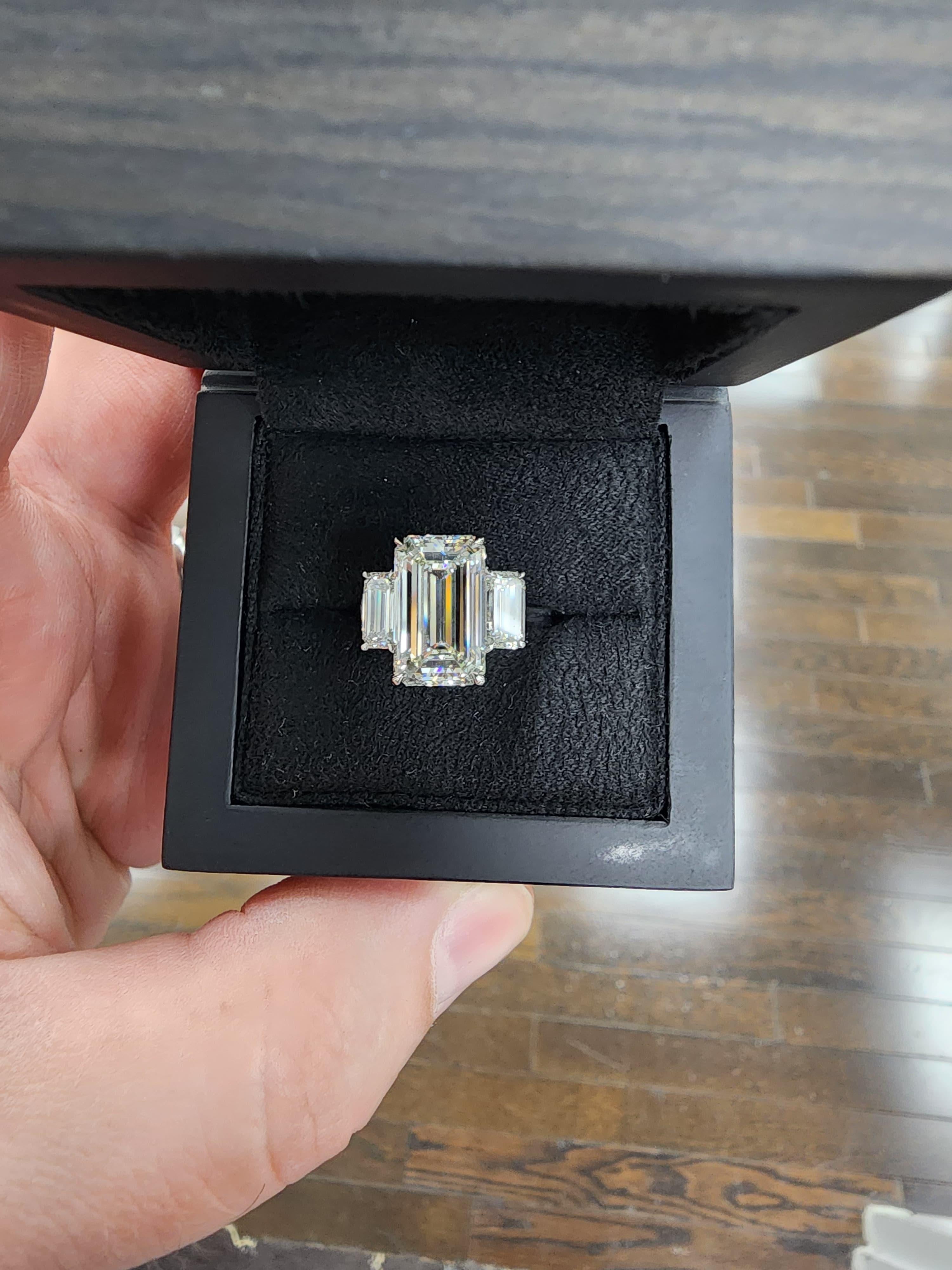 Louis Newman & Co GIA certified 5.11 carat Emerald Cut Diamond Three Stone Ring In New Condition For Sale In New York, NY