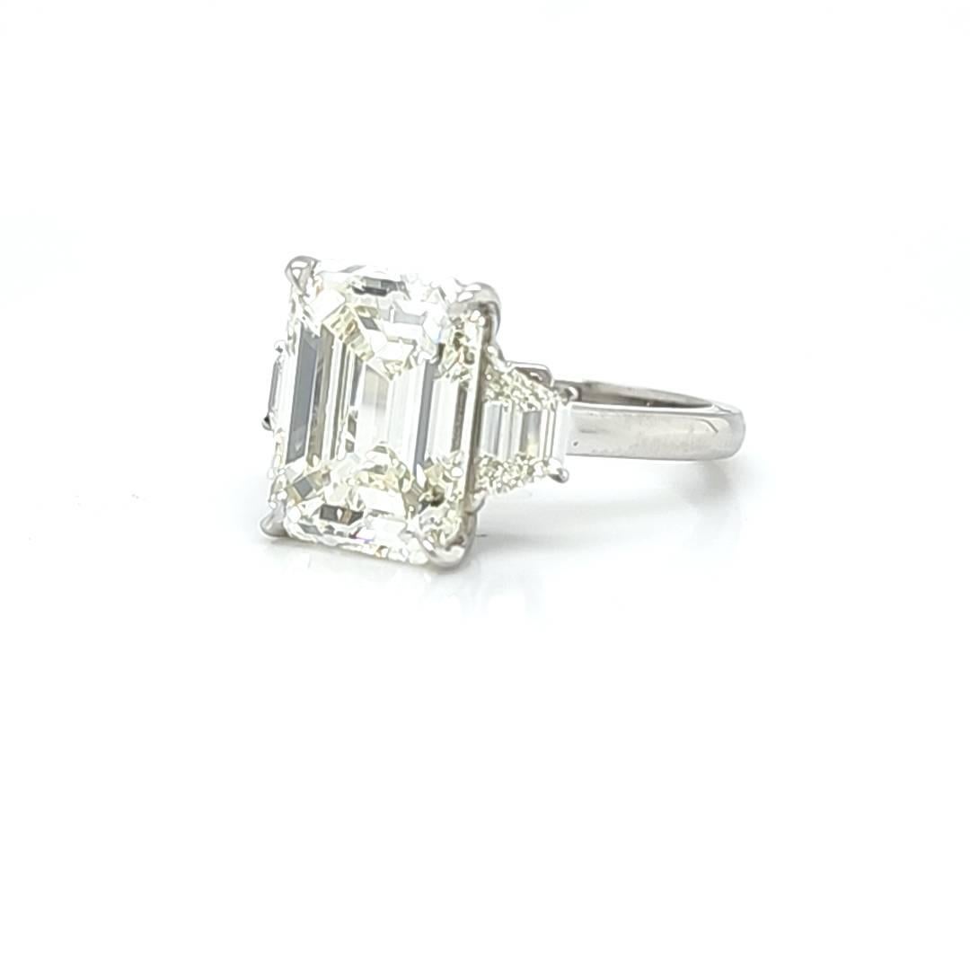 Louis Newman & Co GIA Certified 6.11 Carat Emerald Cut Diamond Three Stone Ring In New Condition For Sale In New York, NY