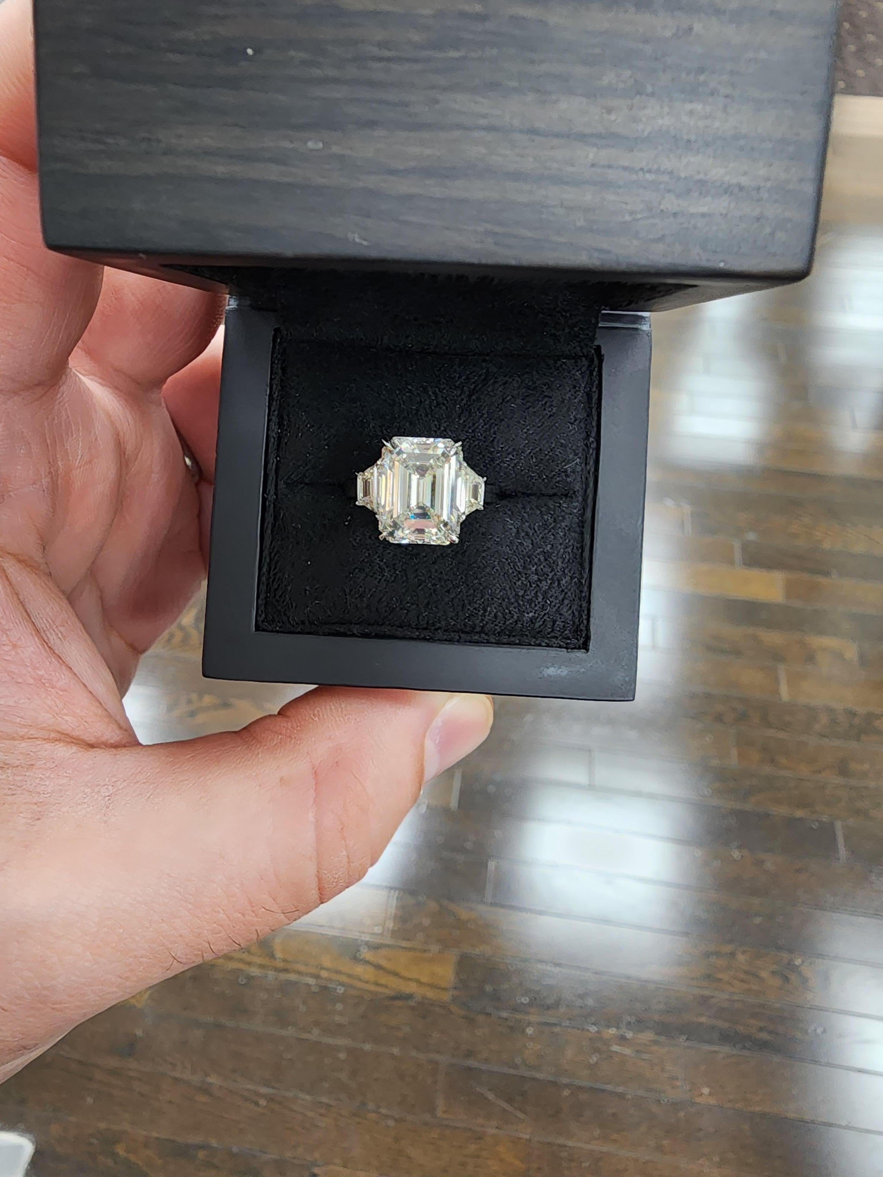 Louis Newman & Co GIA Certified 6.11 Carat Emerald Cut Diamond Three Stone Ring For Sale 3