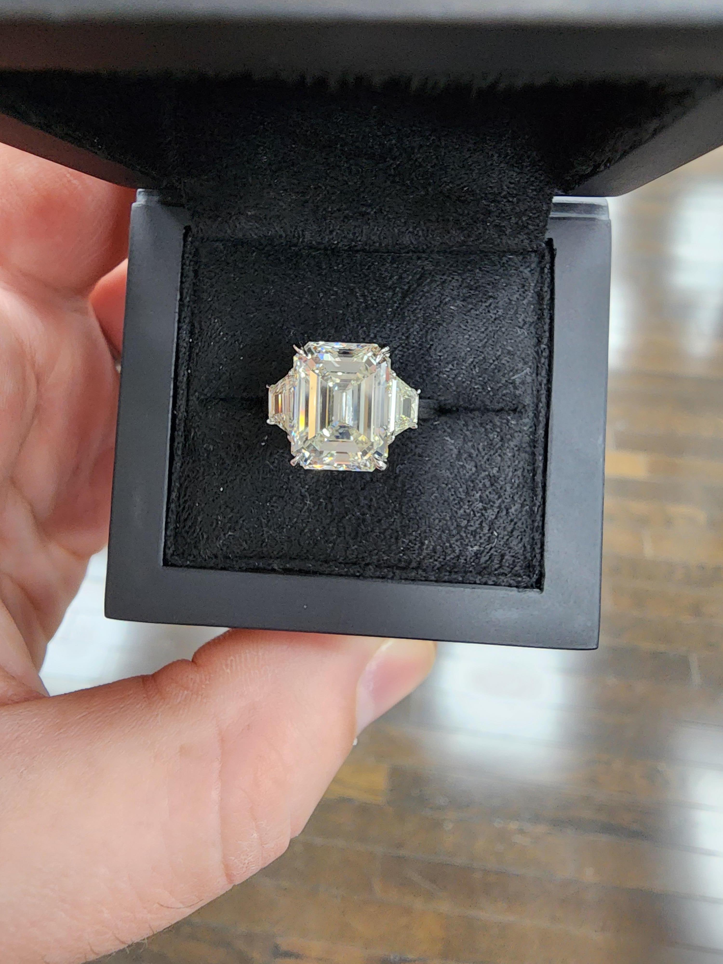 Louis Newman & Co GIA Certified 6.11 Carat Emerald Cut Diamond Three Stone Ring For Sale 4
