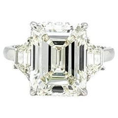 Louis Newman & Co GIA Certified 6.11 Carat Emerald Cut Diamond Three Stone Ring
